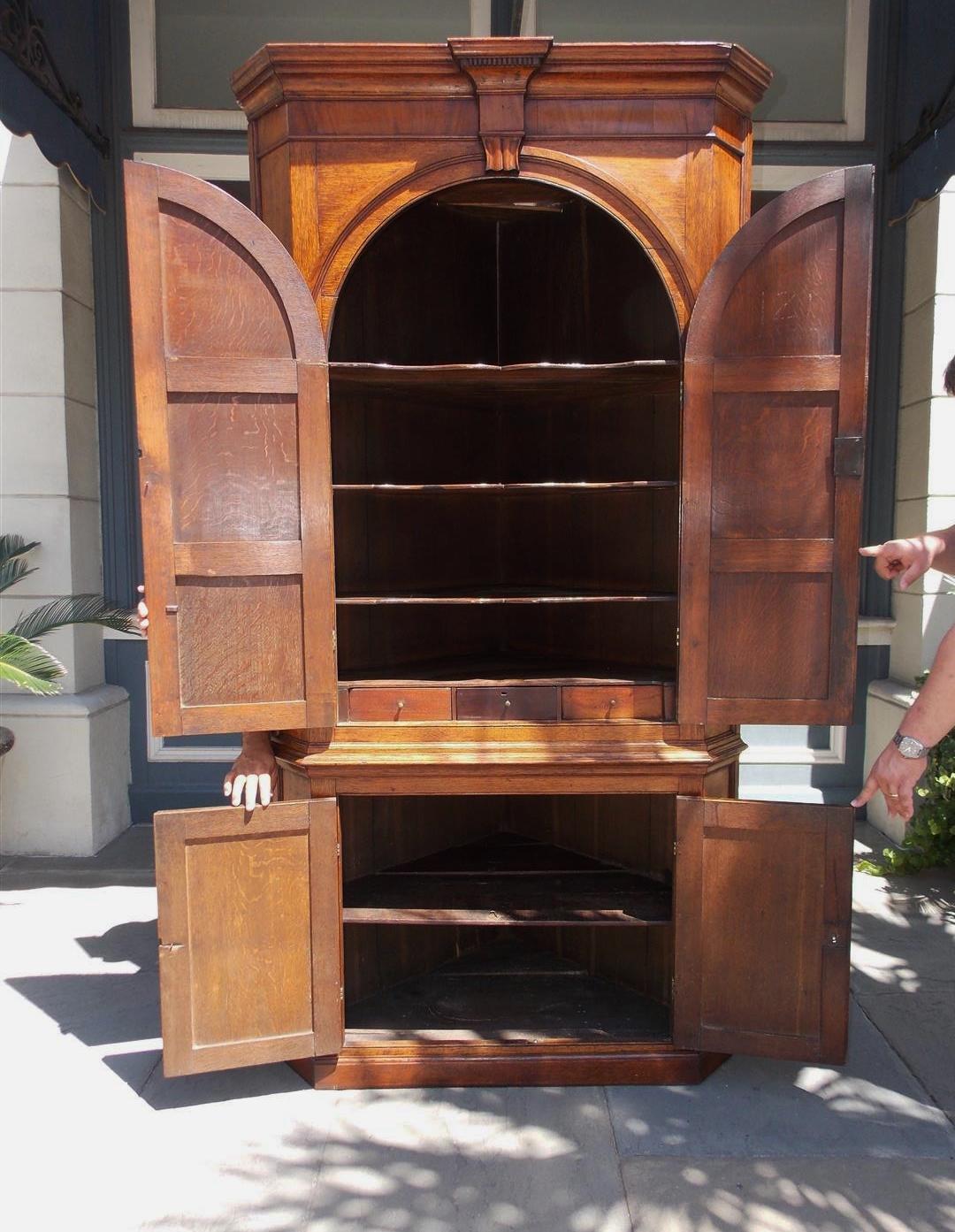 Late 18th Century English Oak Arched and Paneled Blind Door H-Hinged Corner Cabinet, Circa 1770 For Sale