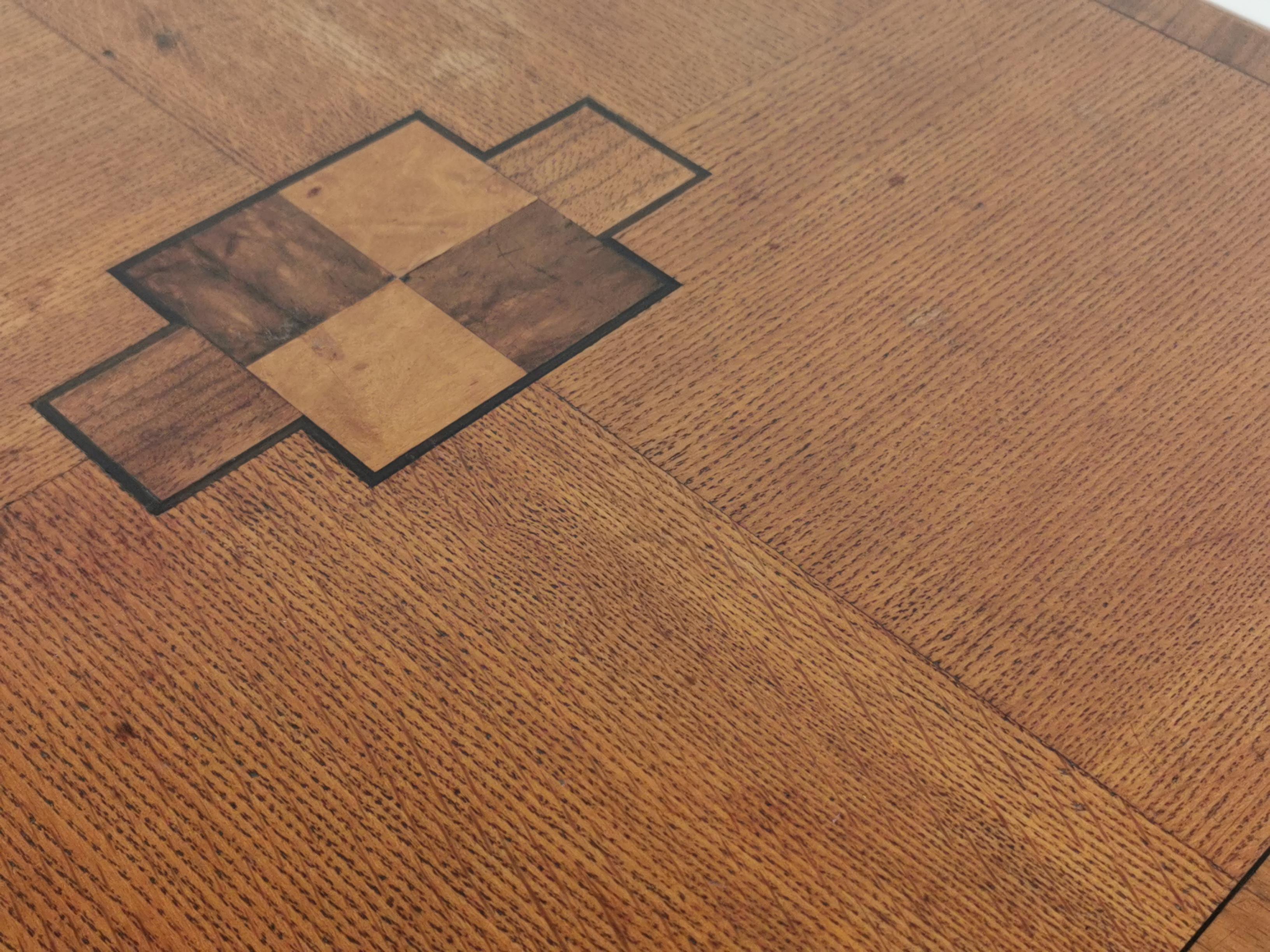 Art Deco coffee table

A unique Art Deco oak geometric low coffee occasional table, circa 1940. 

Superb oak grain, an unusual design with very distinct Art Deco lines and striking geometric patterns on the table surface.

Very compact, the