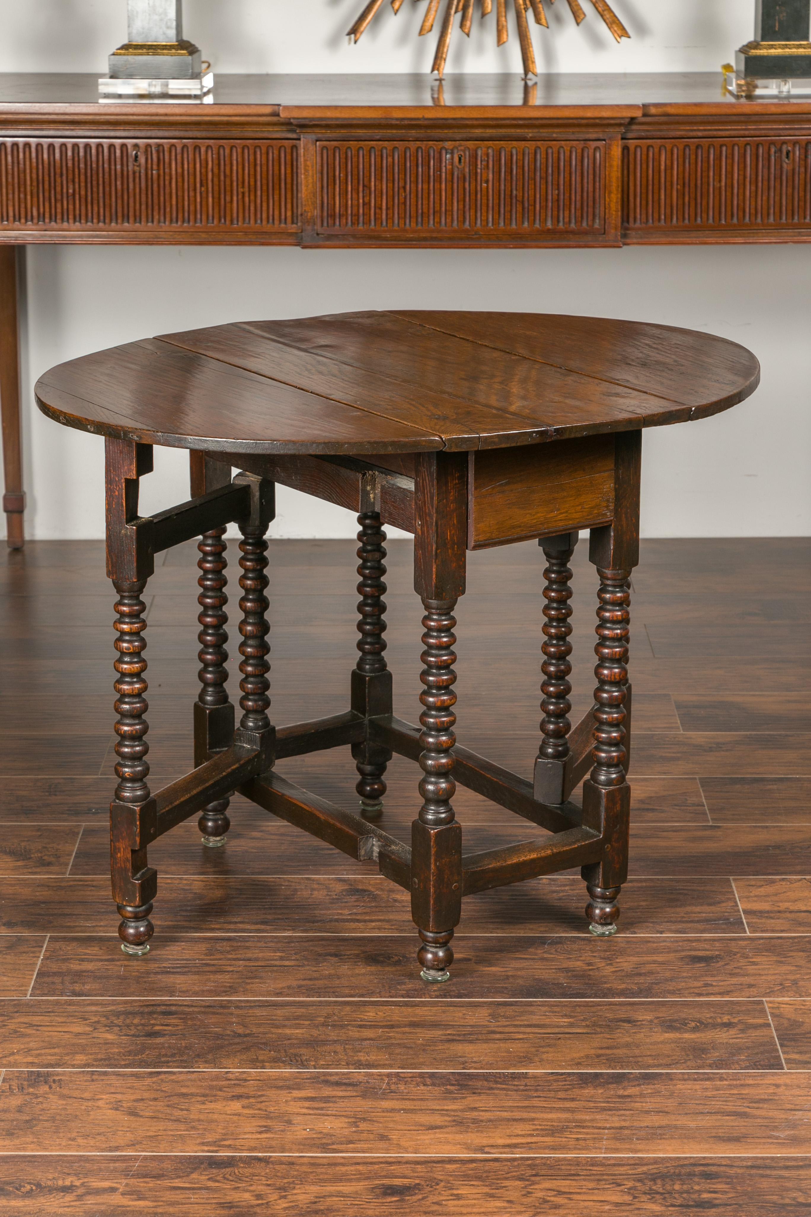 English Oak Bobbin Leg Drop-Leaf Oval Table with Single Drawer and Stretchers 6
