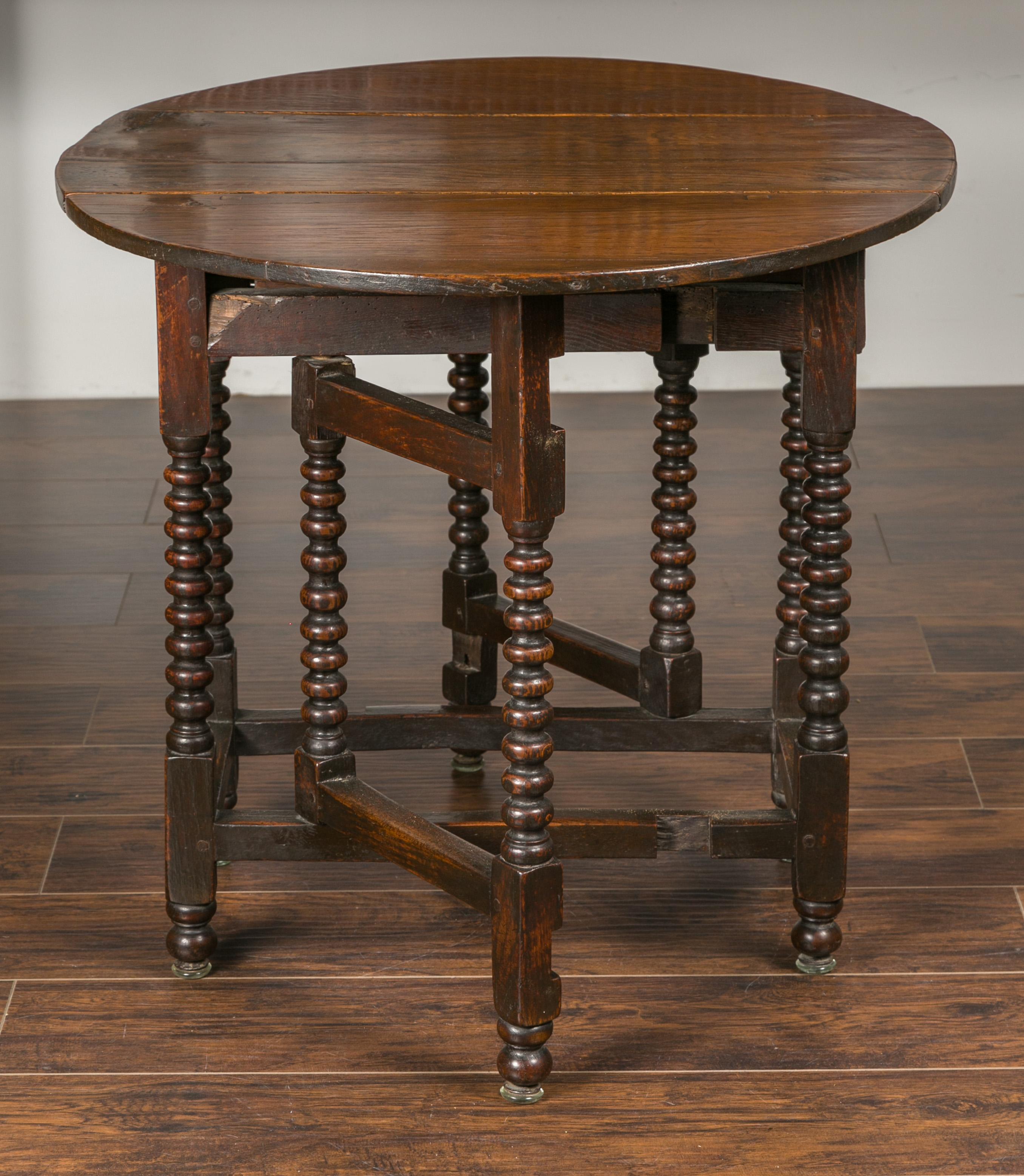 English Oak Bobbin Leg Drop-Leaf Oval Table with Single Drawer and Stretchers 7
