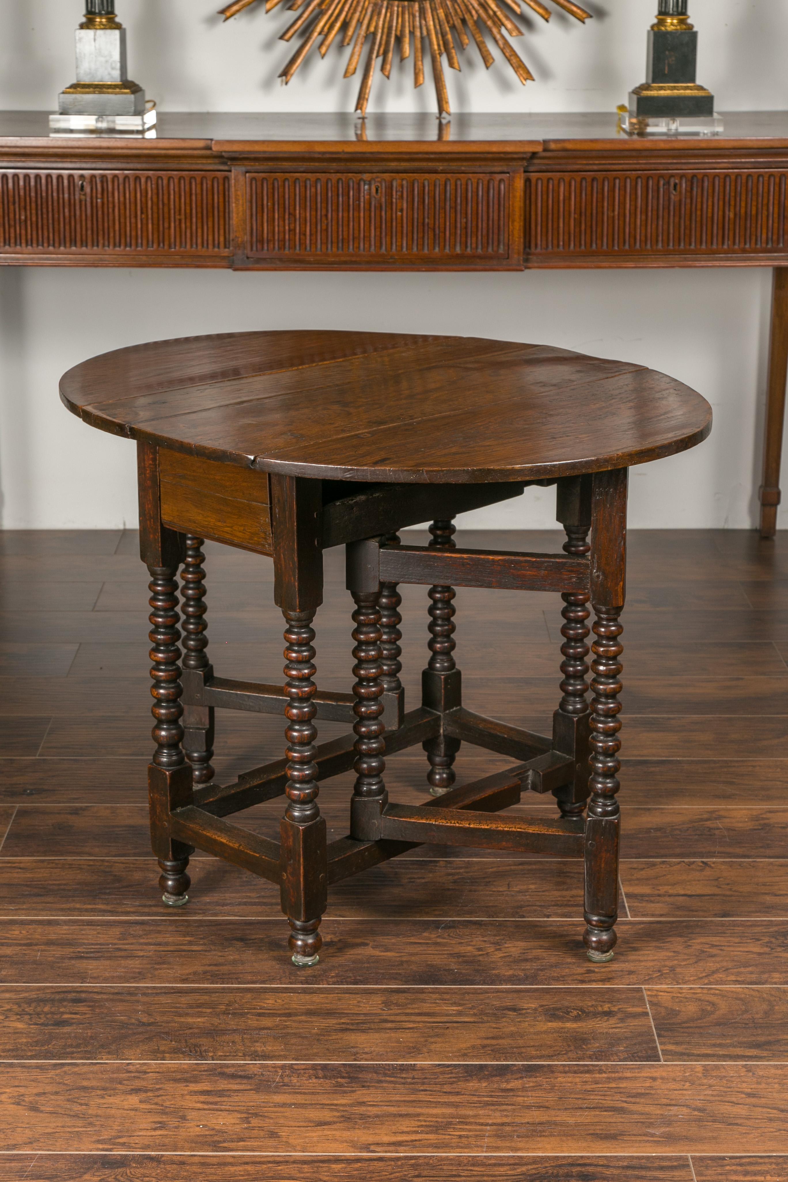 English Oak Bobbin Leg Drop-Leaf Oval Table with Single Drawer and Stretchers 1