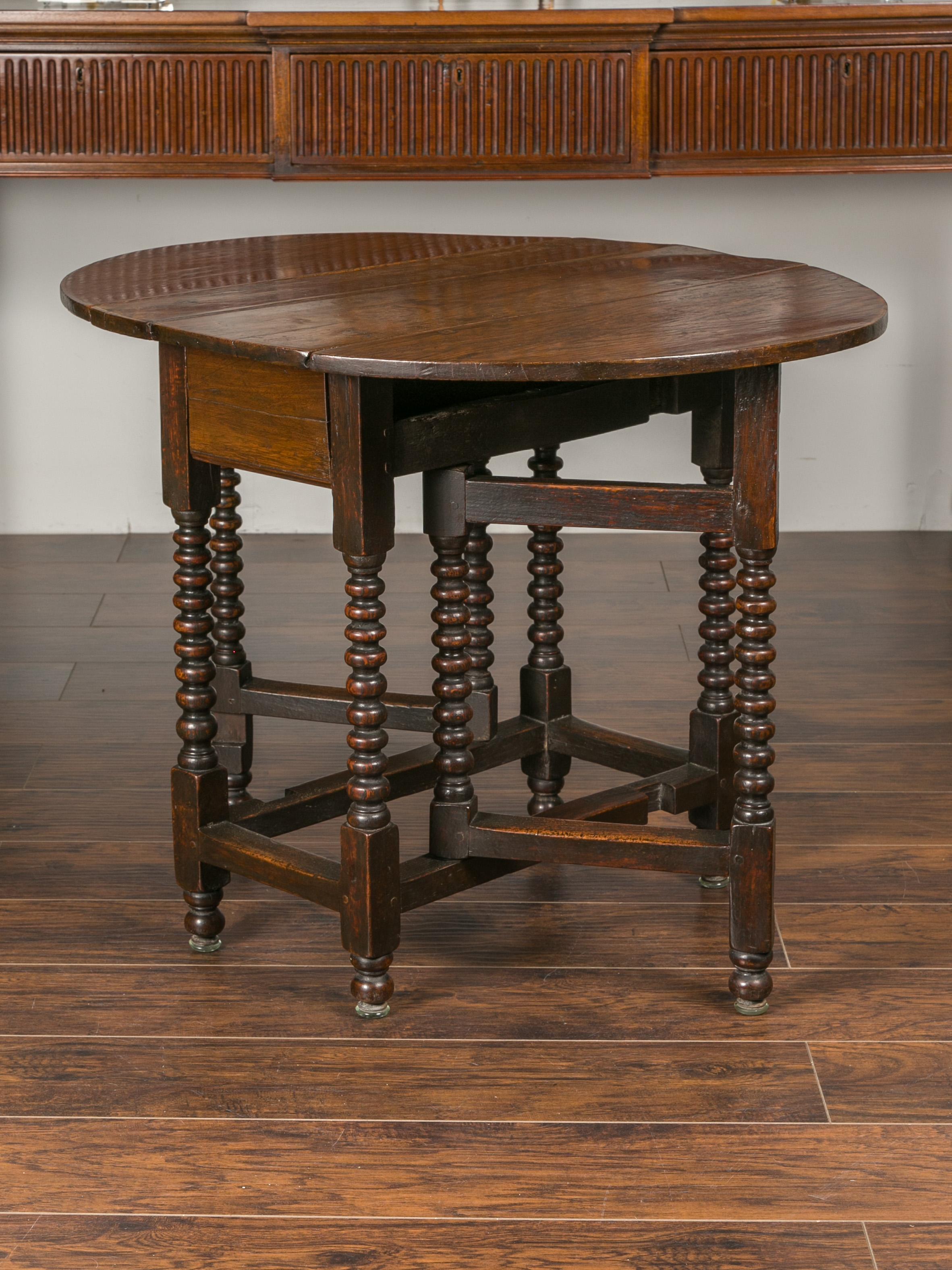 English Oak Bobbin Leg Drop-Leaf Oval Table with Single Drawer and Stretchers 2