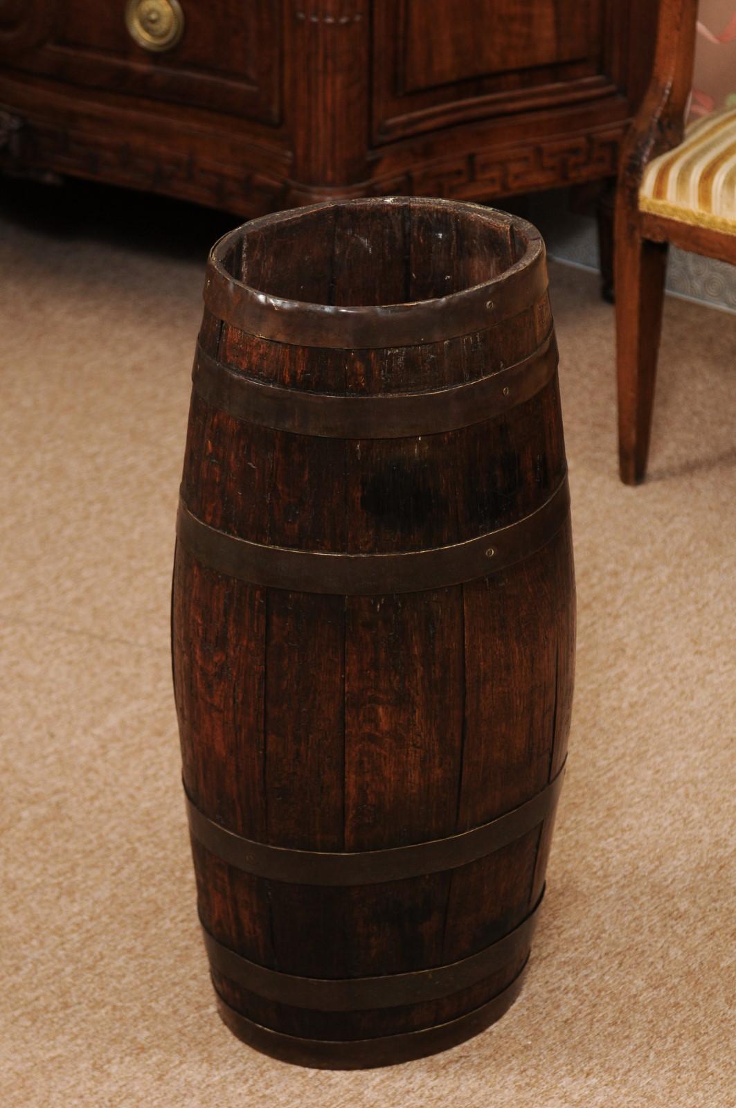The late 19th century English oak barrell with brass banding.