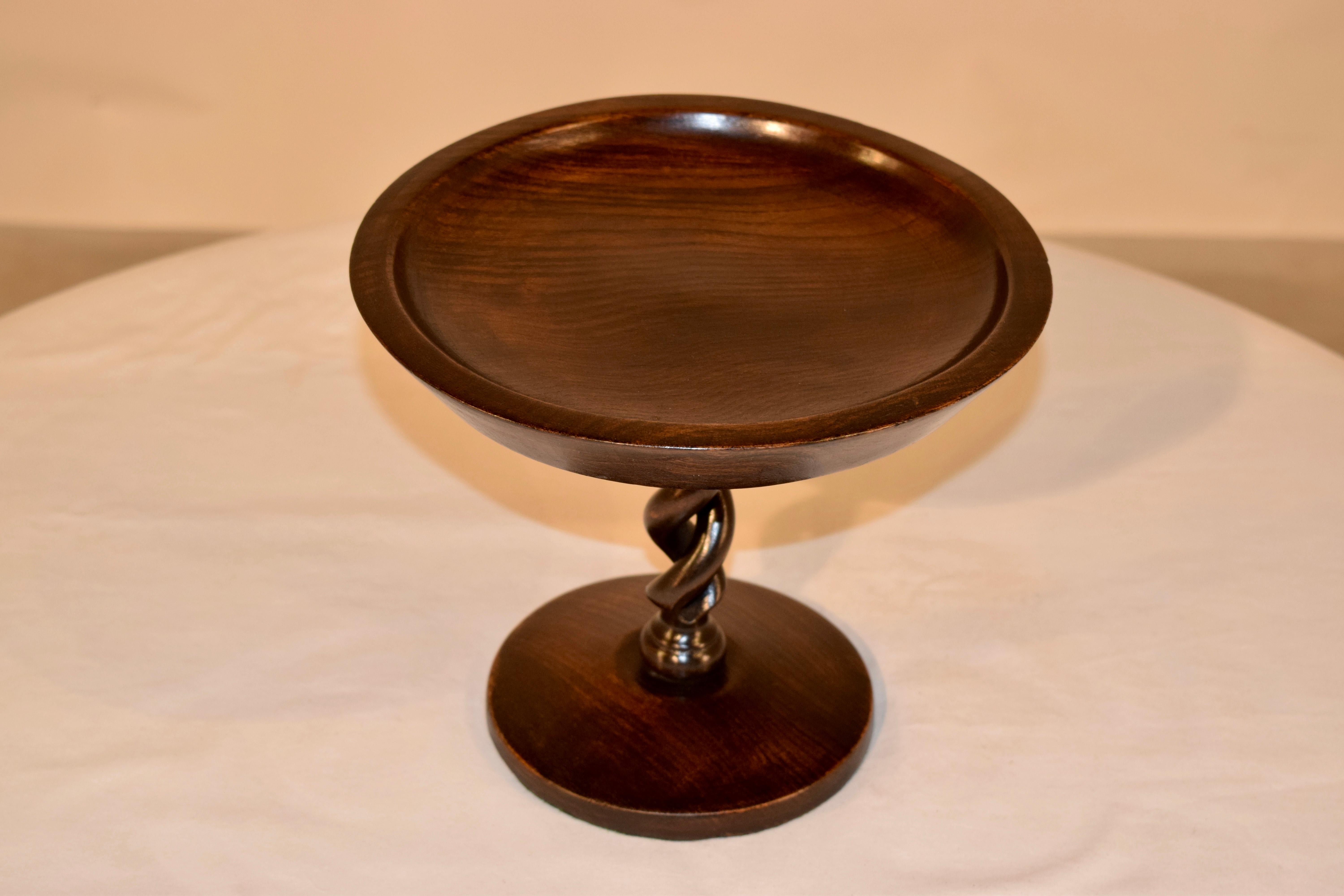 English oak hand-turned compote with a bowl shaped top supported on a hand-turned open barley twist column and turned base.