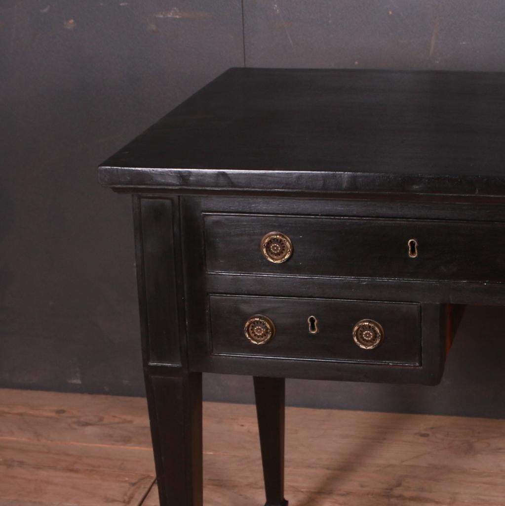 Early 19th century black ebonized oak desk, 1820.

Dimensions of knee hole: 18 W