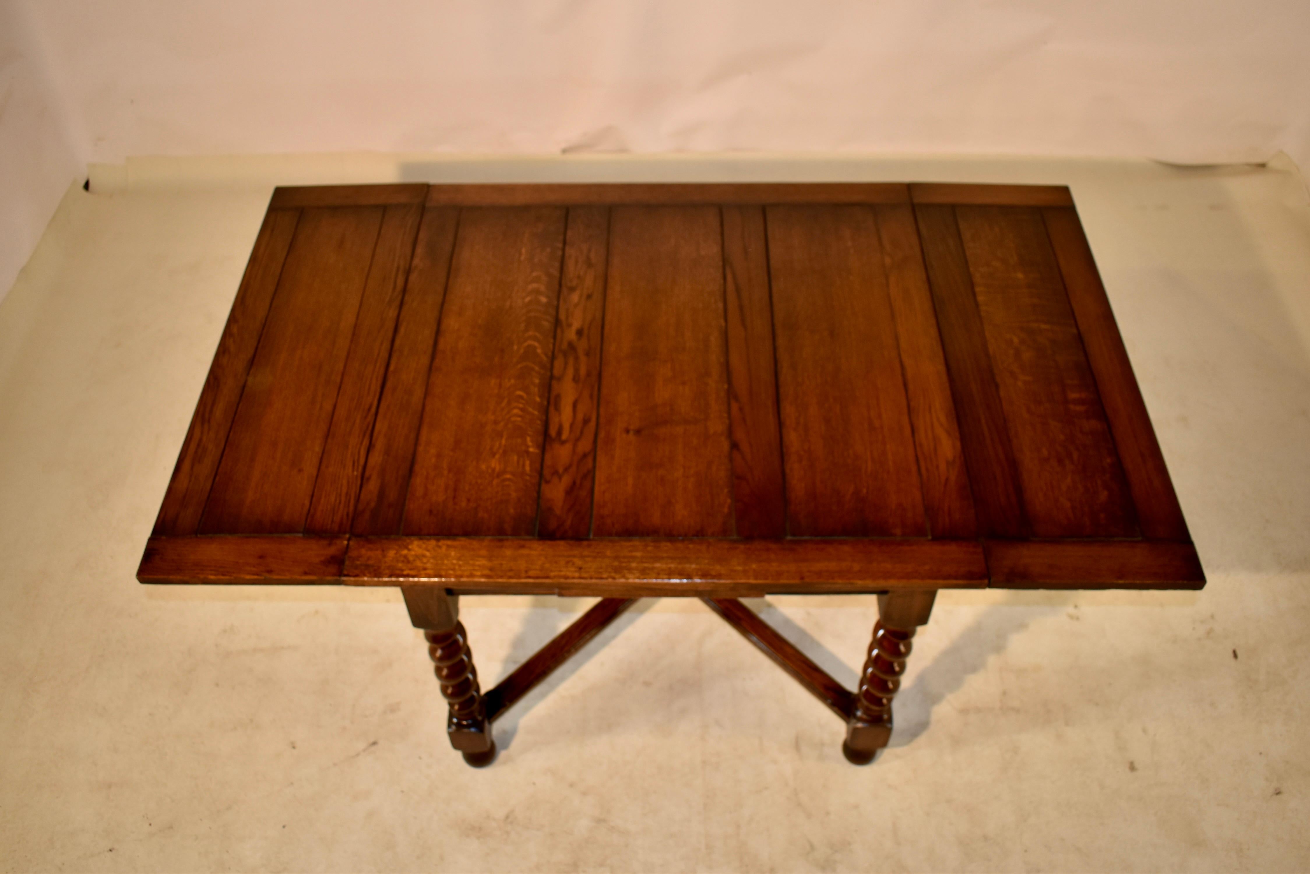 Early 20th Century English Oak Draw Leaf Table, c. 1900 For Sale