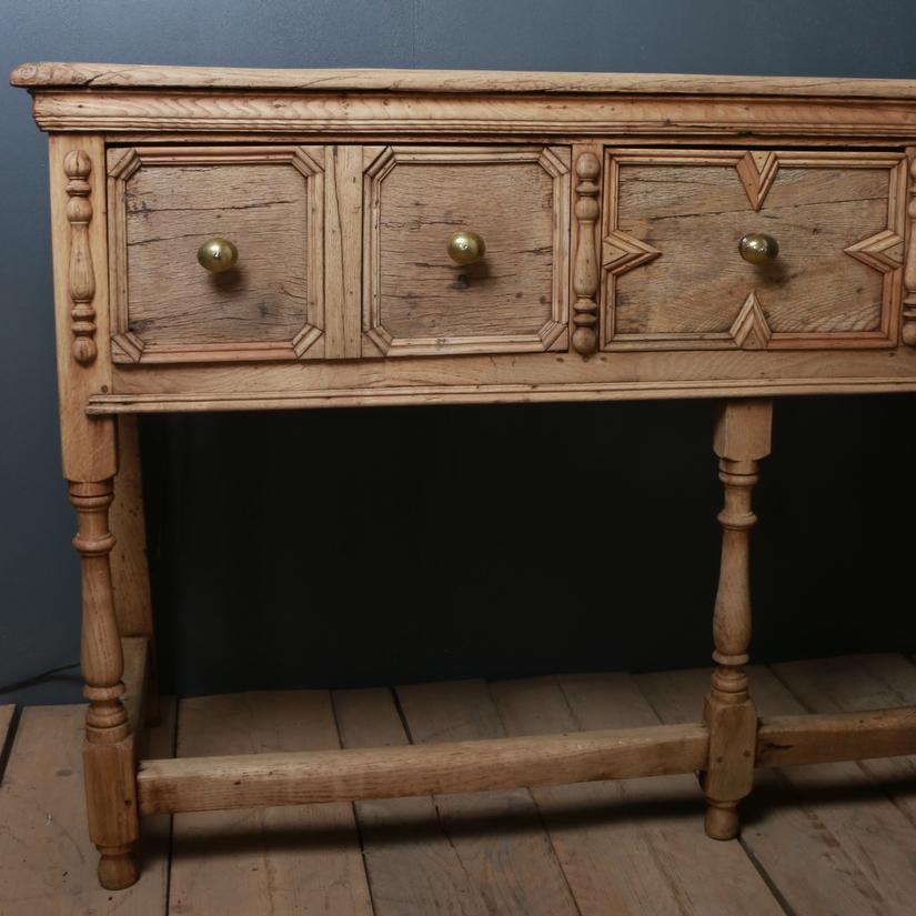 Early 18th century English bleached oak dresser base, 1740

Dimensions:
50.5 inches (128 cms) wide
19.5 inches (50 cms) deep
35 inches (89 cms) high.

 