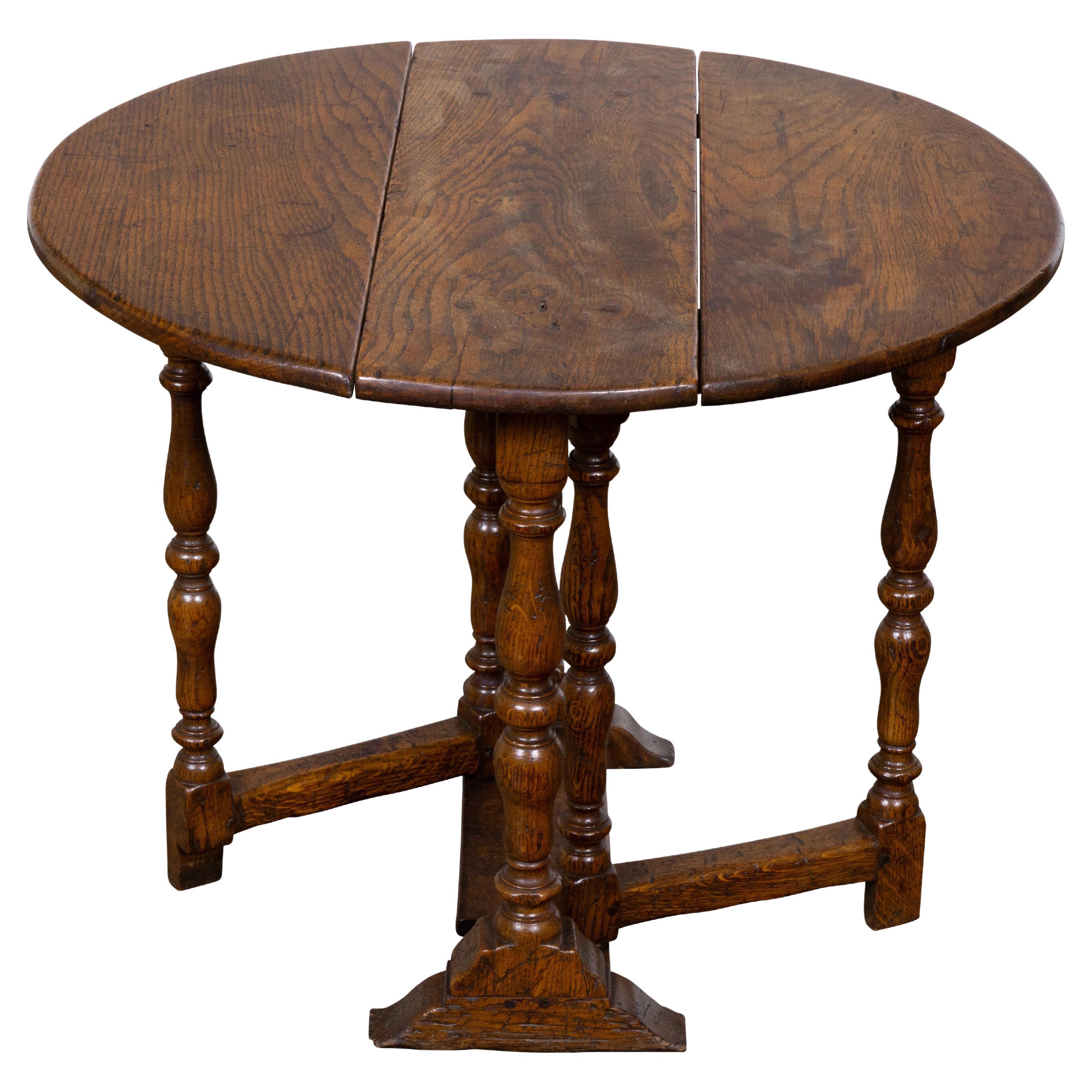 English Oak Drop-Leaf Gateleg Table with Turned Legs and Stretchers, Circa 1900