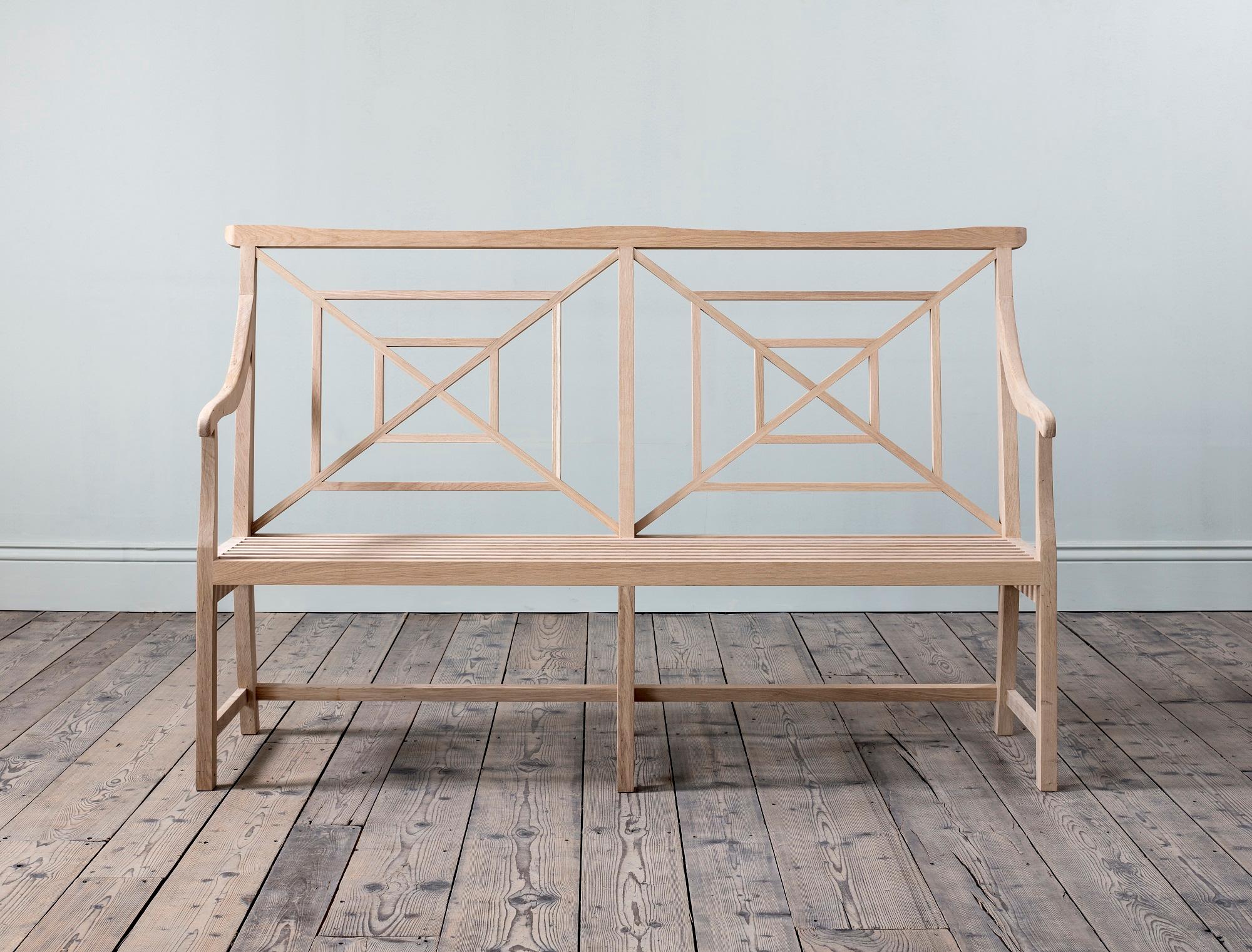 This magical garden bench is made from solid English oak. The carefully sandblasted finish emphasises the fretwork construction of the back and highlights the grain of this truly British timber. The original example came from Saltram House on the