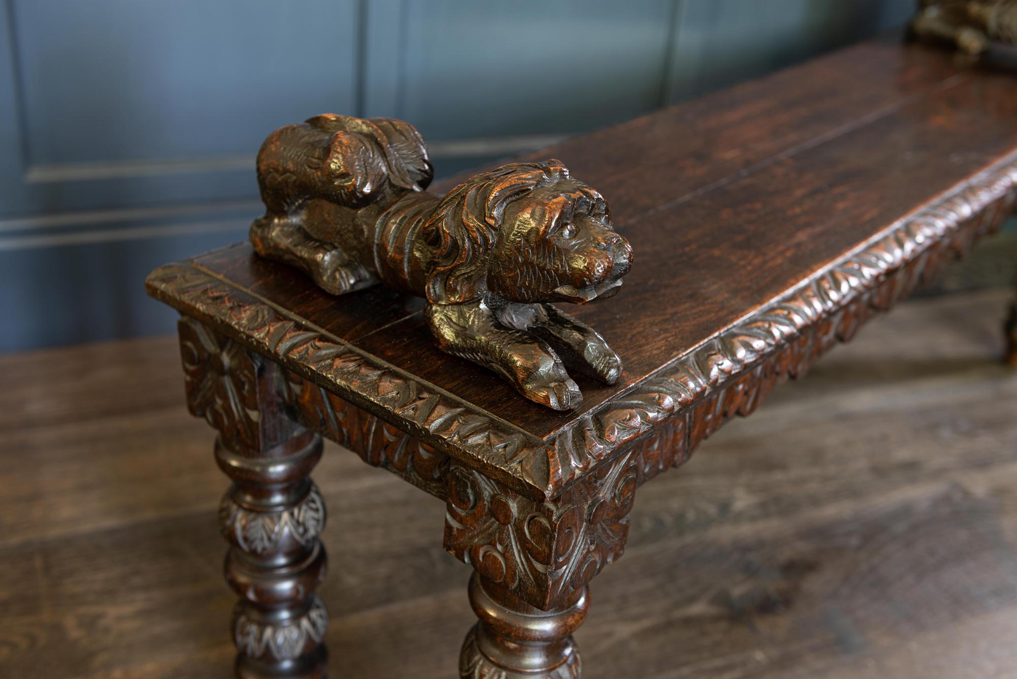 19th Century English Oak Hand Carved Bench Settle with Recumbent Carved Lions For Sale