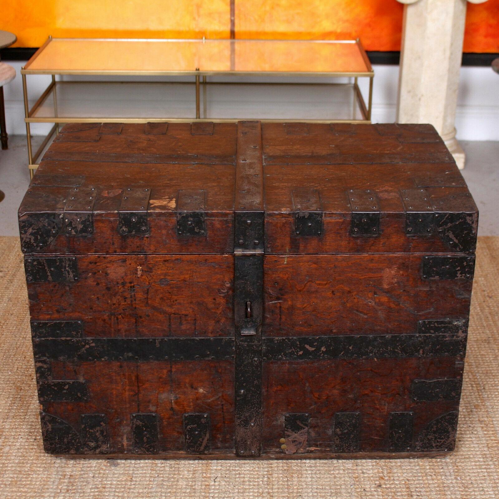 An impressive late 19th century oak and iron bound chest formerly used as a silver chest.

England, circa 1880.
 