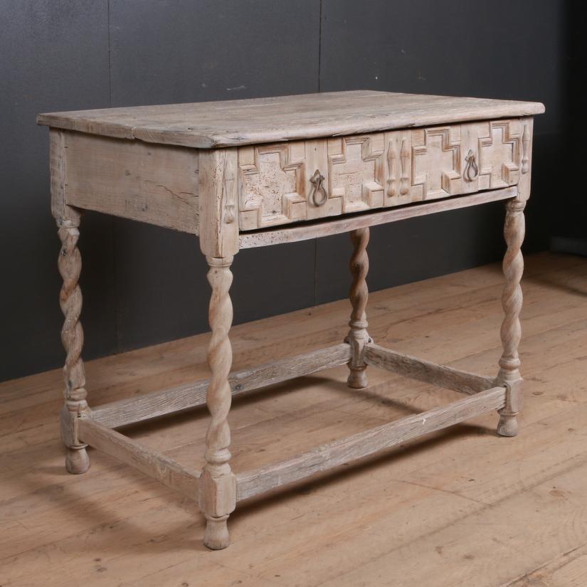 18th century English bleached oak country lamp table with geometric moulding and barley twist legs, 1780.

Dimensions:
35.5 inches (90 cms) wide
27.5 inches (70 cms) deep
29.5 inches (75 cms) high.

 