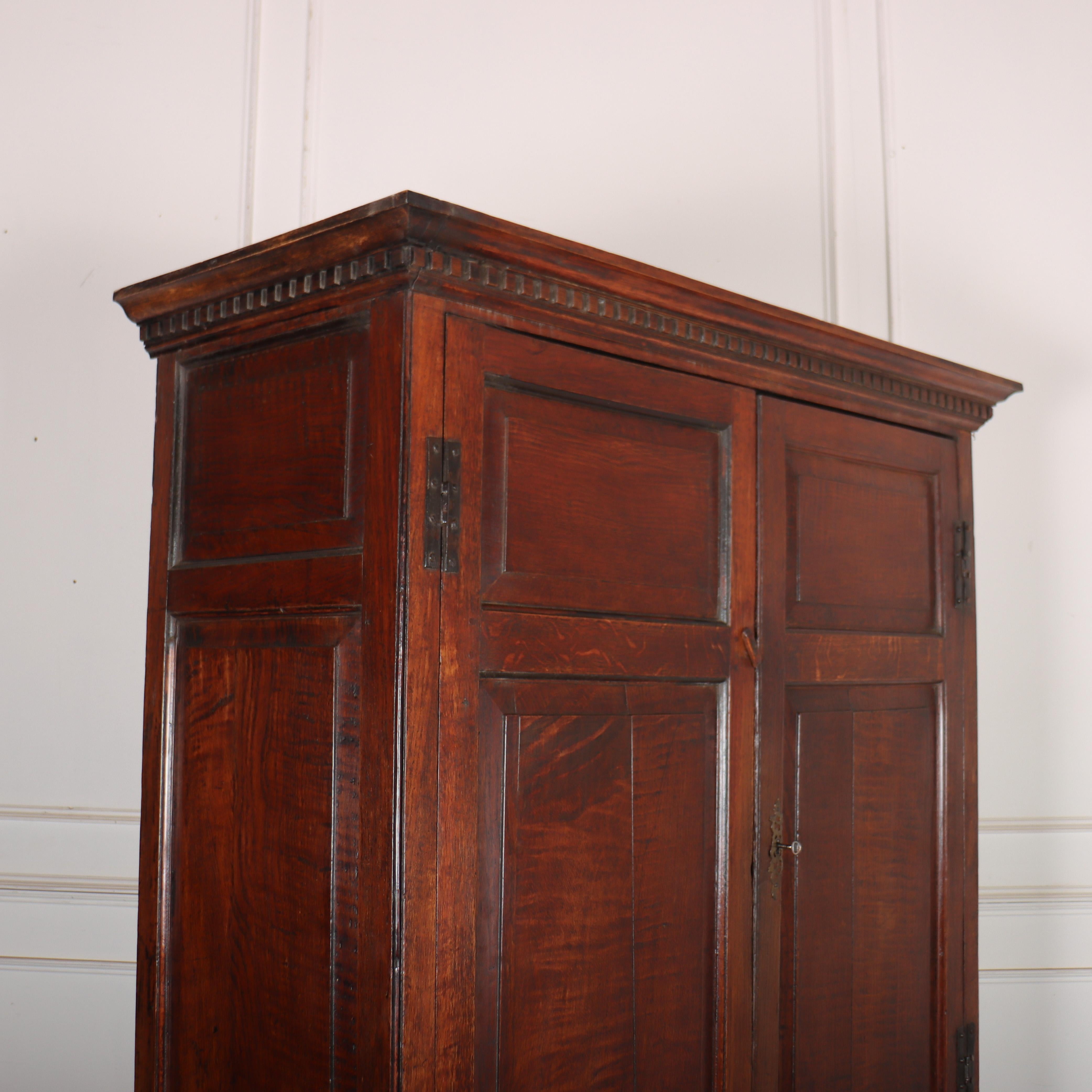 Pretty 18th century oak linen press with internal hanging rail and very good colour. 1760. 

Upper interior depth: 17-inches (43cm)


Code: 9075

Dimensions:
W: 51.5