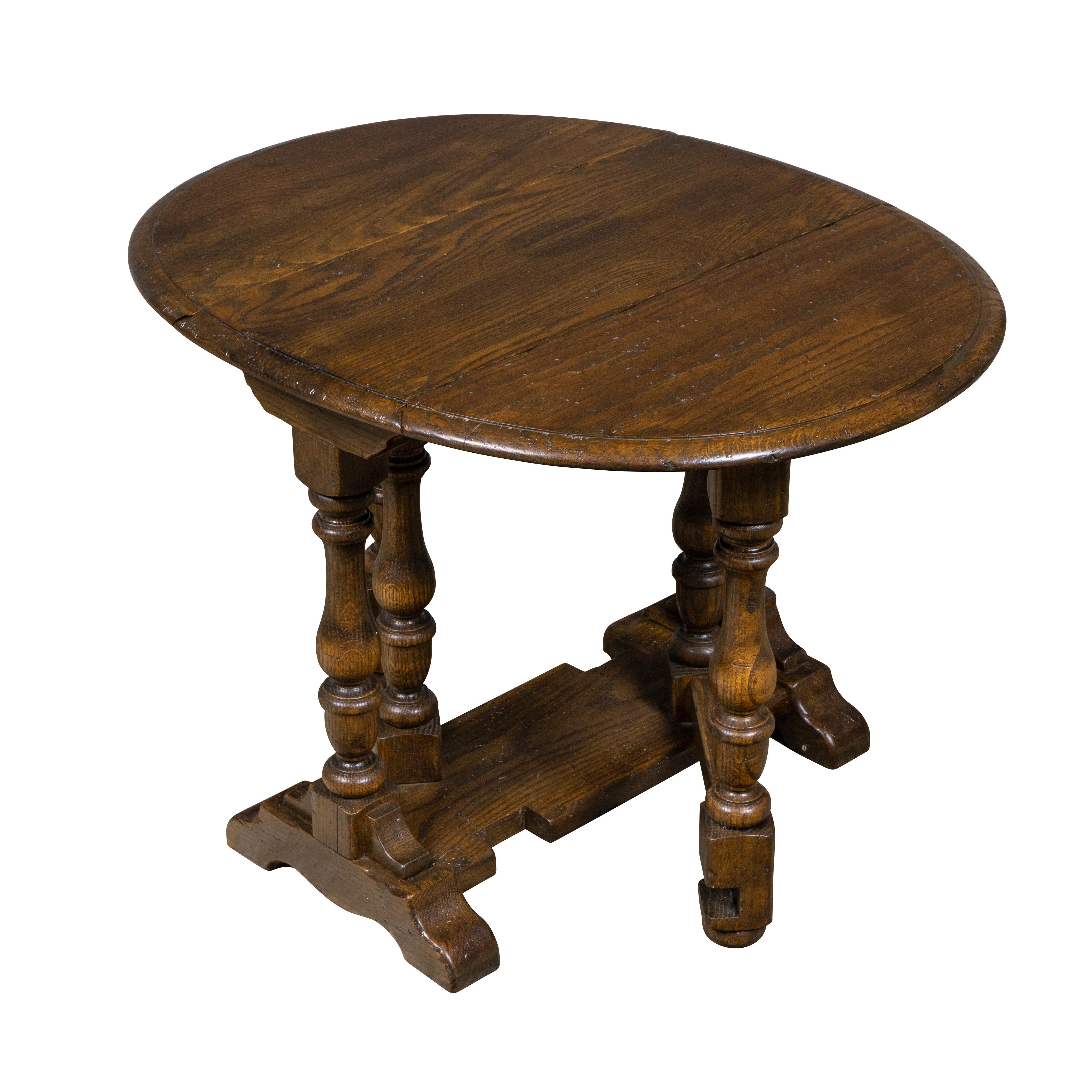 English Oak Oval Drop-Leaf Gateleg Table with Turned Baluster Legs, Circa 1900 For Sale