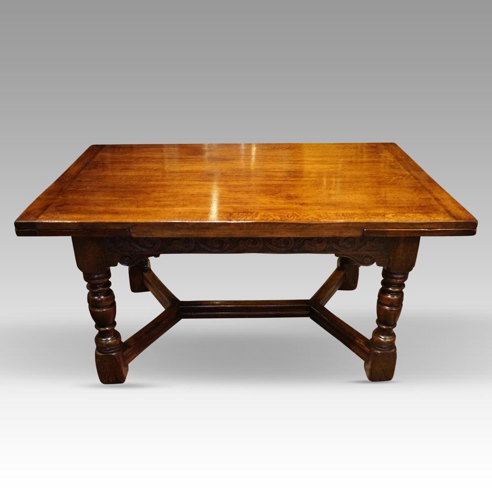 
Oak refectory draw leaf dining table 
This Oak refectory draw leaf dining table was made circa 1920 in a high-quality workshop, probably Titchmarsh and Goodwin the famous specialists in oak.
The table is rectangular and has a draw leaf that pulls