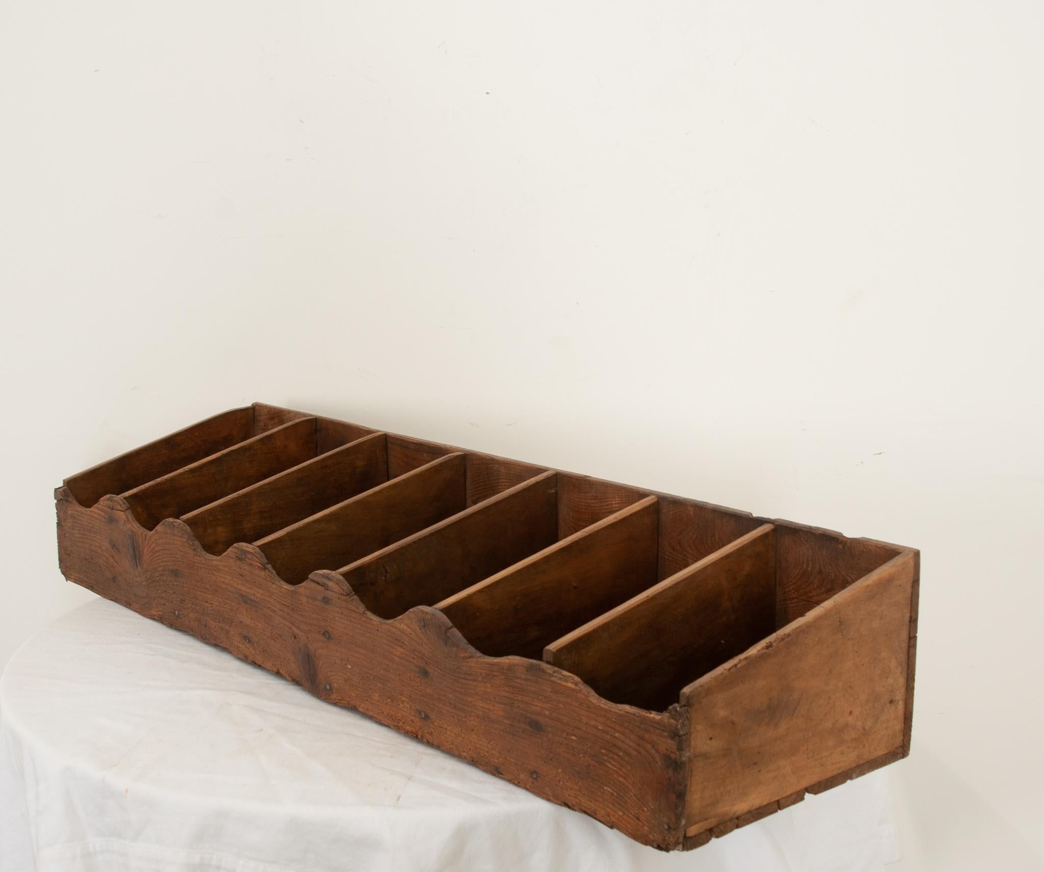 Crafted from solid oak in England, this freestanding divided display box was originally used for merchants to sell seeds or other smaller objects. From organizing utensils to art supplies to spices- it’s wonderfully versatile. Many decades of use