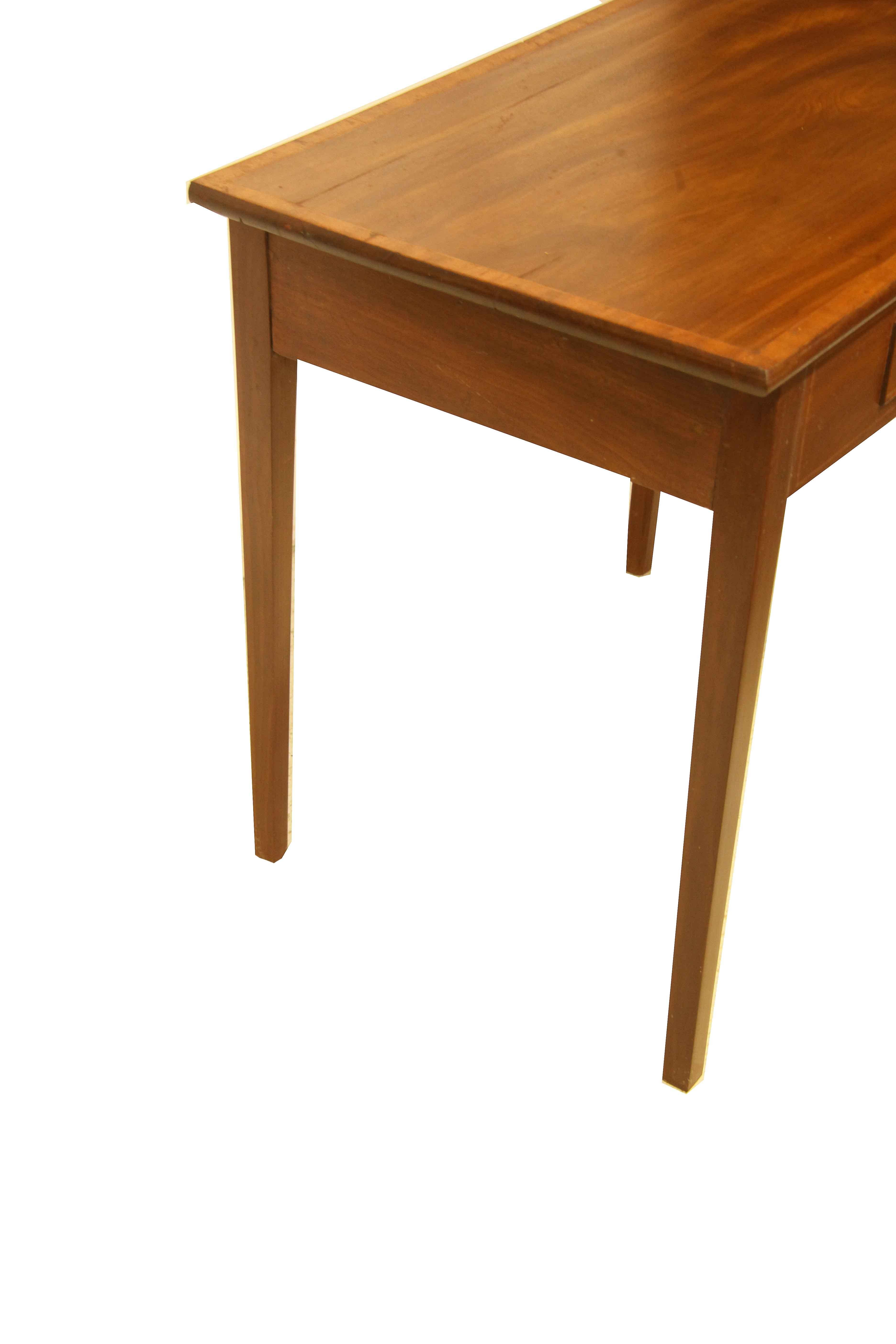 English one drawer table, the top features a beautiful swirl grain and color with a band of satinwood and boxwood cross banding around the perimeter. The front is inlaid with boxwood as well. The single drawer has a swan neck pull that is hand made