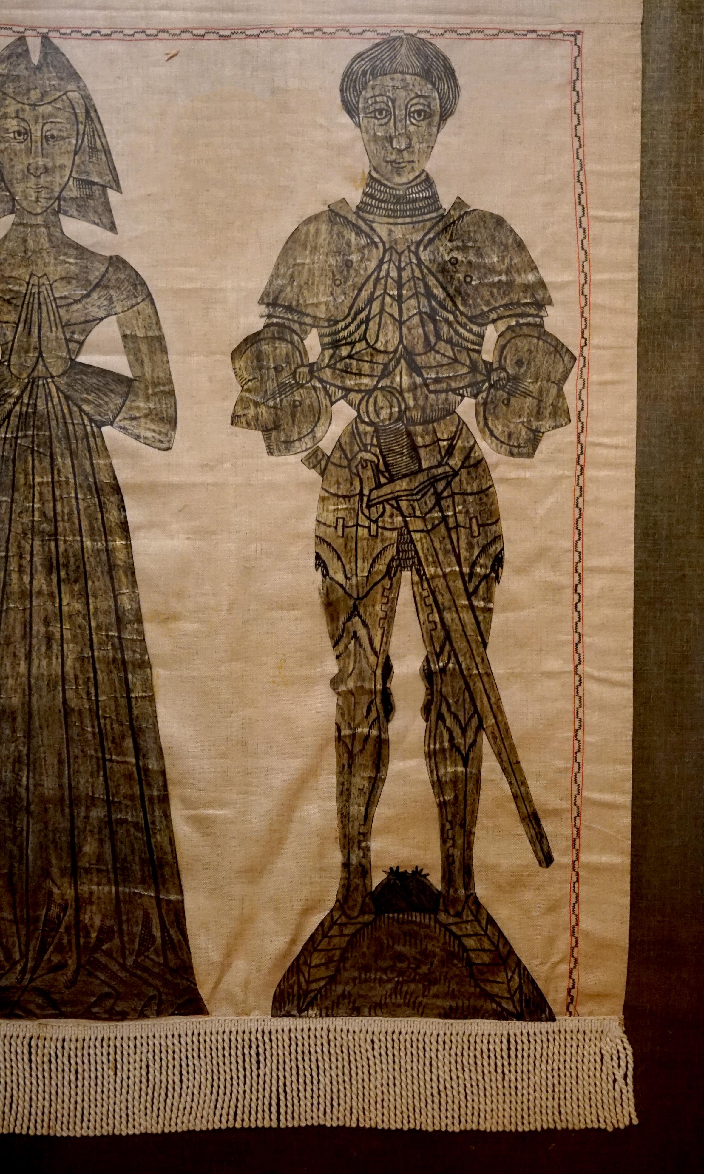 A Gothic Revival style engraved brass rubbing, English or Continental, from the 19th Century. This is a beautiful piece with two figures who are dressed in elaborate clothing reserved for the gentry. Their hands are clasped in a prayer-like