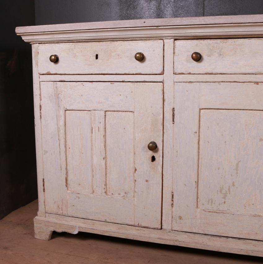 Very good original painted English dresser base with a scrubbed oak top, 1820.



Dimensions
90 inches (229 cms) wide
22.5 inches (57 cms) deep
38 inches (97 cms) high.