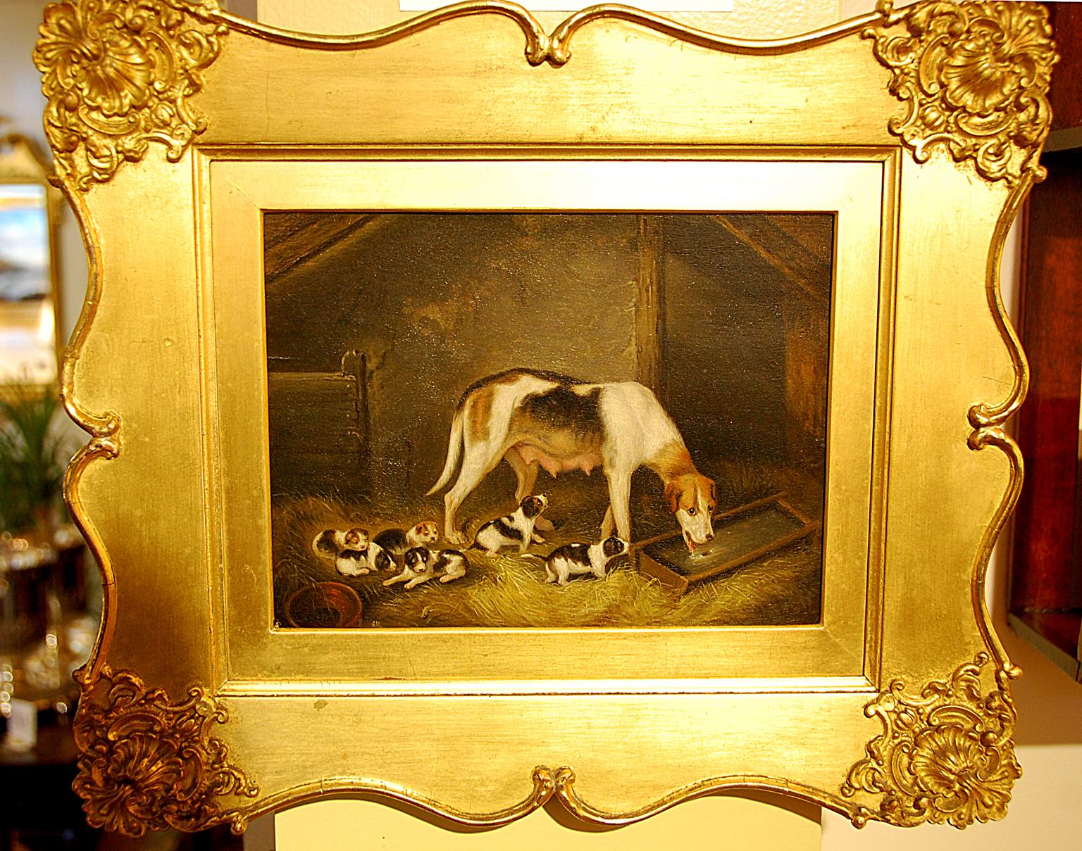 English pair of signed Samuel Raven oil paintings on panel of hound dogs. One is of a female hound and her puppies in a barn, the other is a pair of hound dogs running in a landscape; 