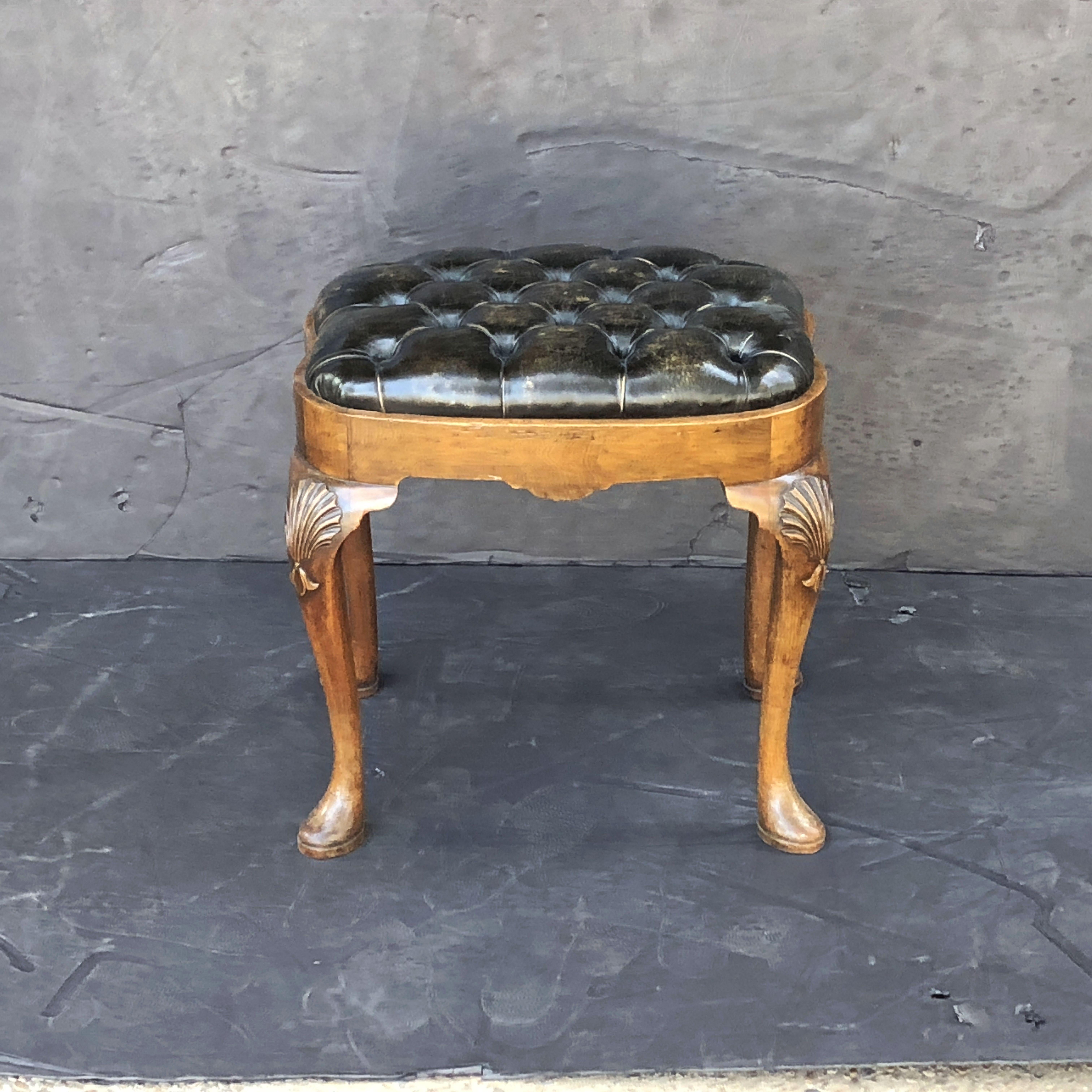 Carved English Ottoman Stool of Tufted Leather on Walnut Cabriole Legs