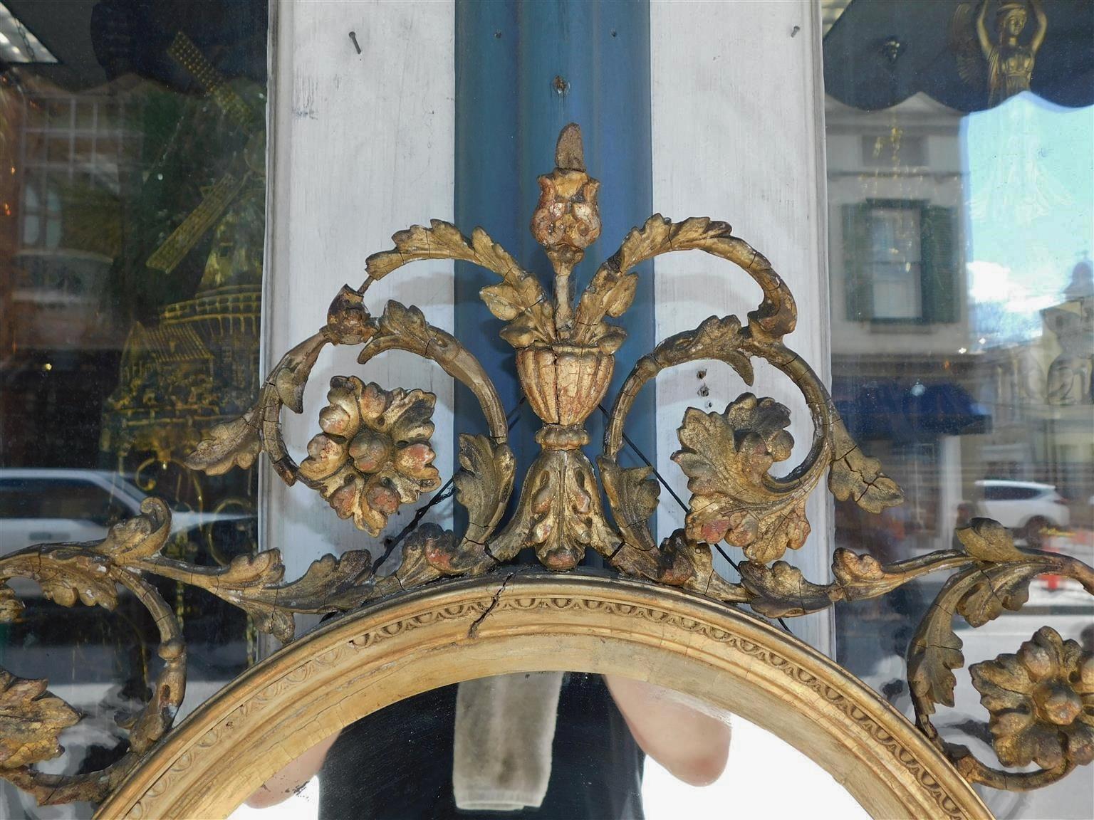 Early 19th Century English Oval Gilt Carved Wood and Gesso Scrolled Foliage Wall Mirror, C. 1800 For Sale