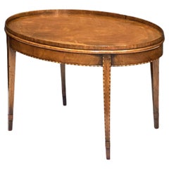 English Oval Low Side or Coffee Table of Inlaid Mahogany