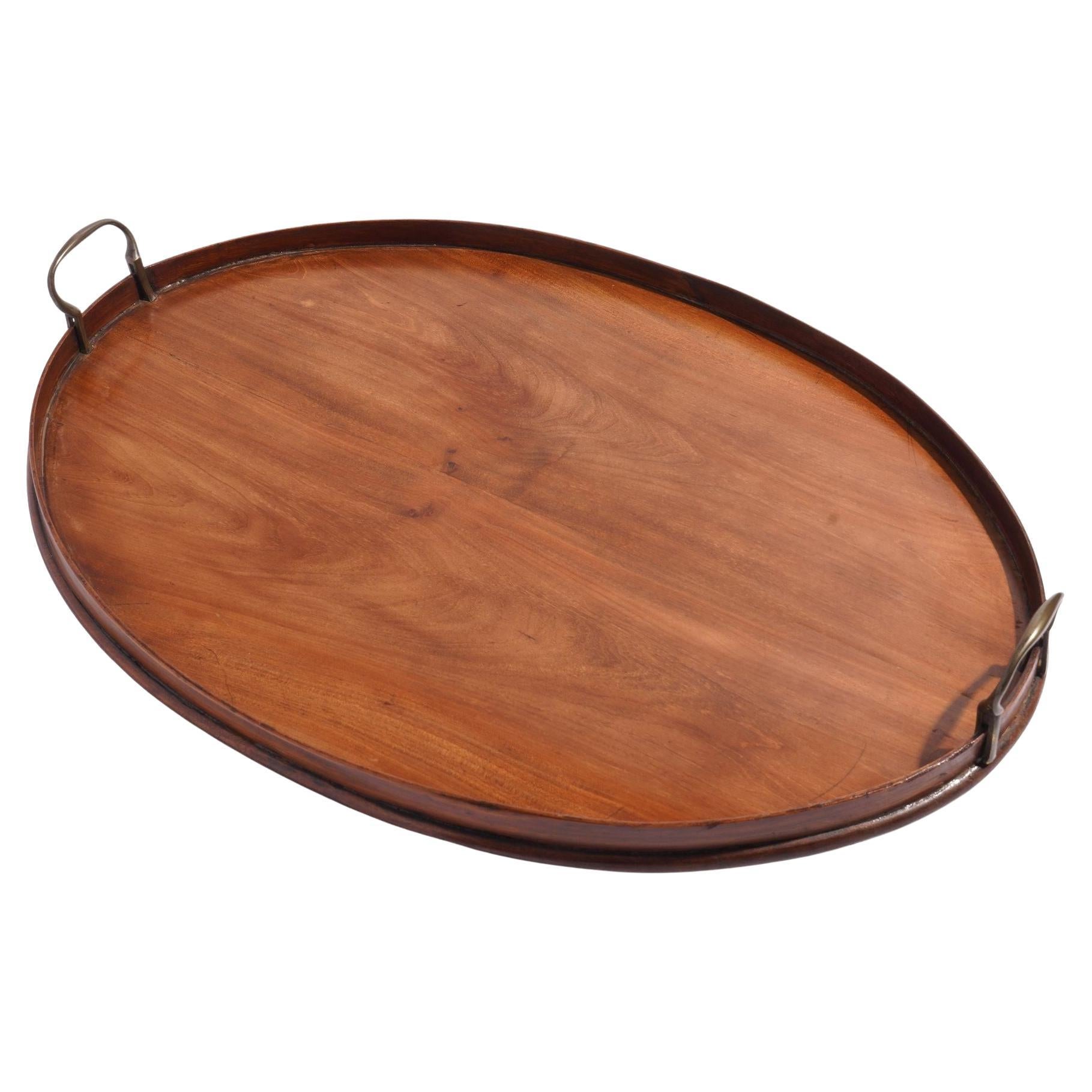 English oval mahogany standing rim tray with brass handles, c. 1850-1900