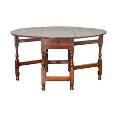 English Oval Oak Drop-Leaf Table with Single Drawer and Baluster Legs
