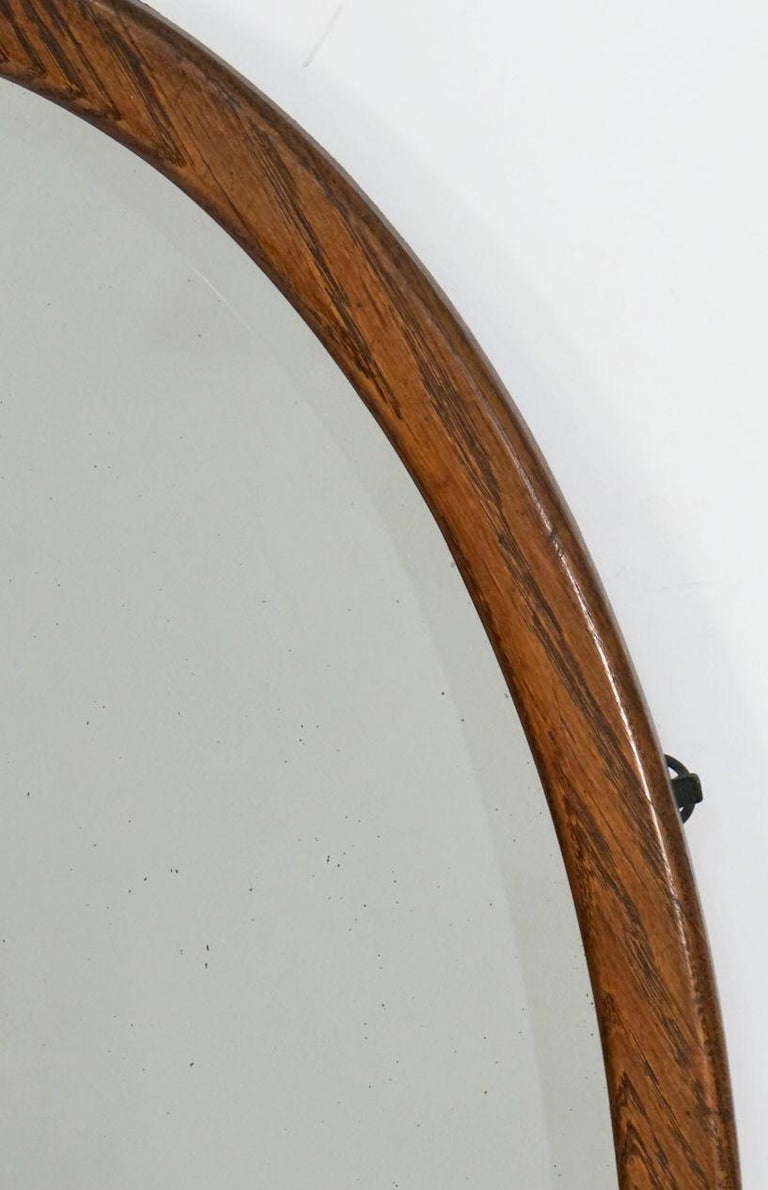 English Oval Parlour Mirror with Beveled Glass and Oak Frame For Sale