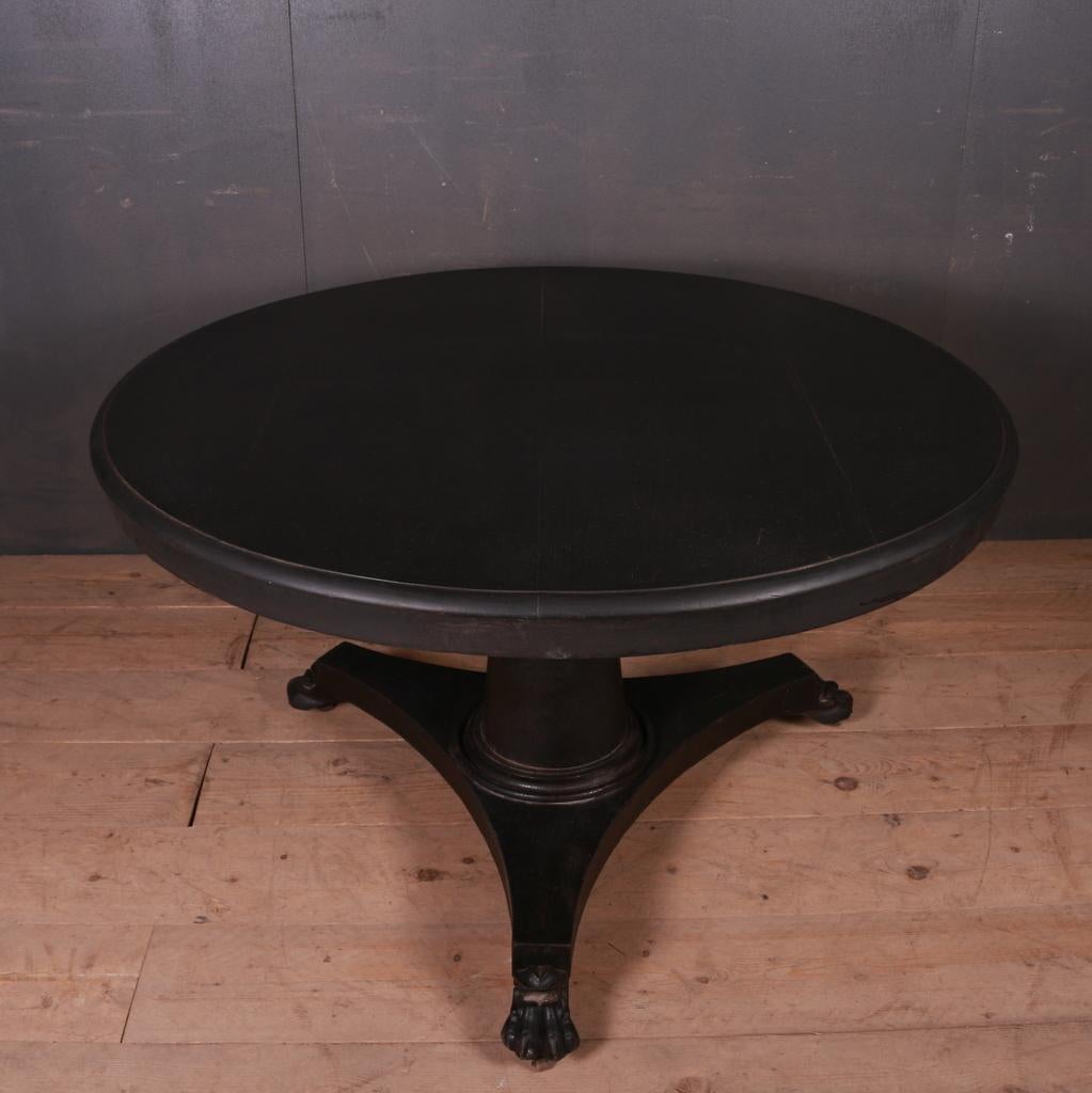 19th century circular painted dining or centre table with good carved paw feet, 1840.

Dimensions
29 inches (74 cms) high
46.5 inches (118 cms) diameter.