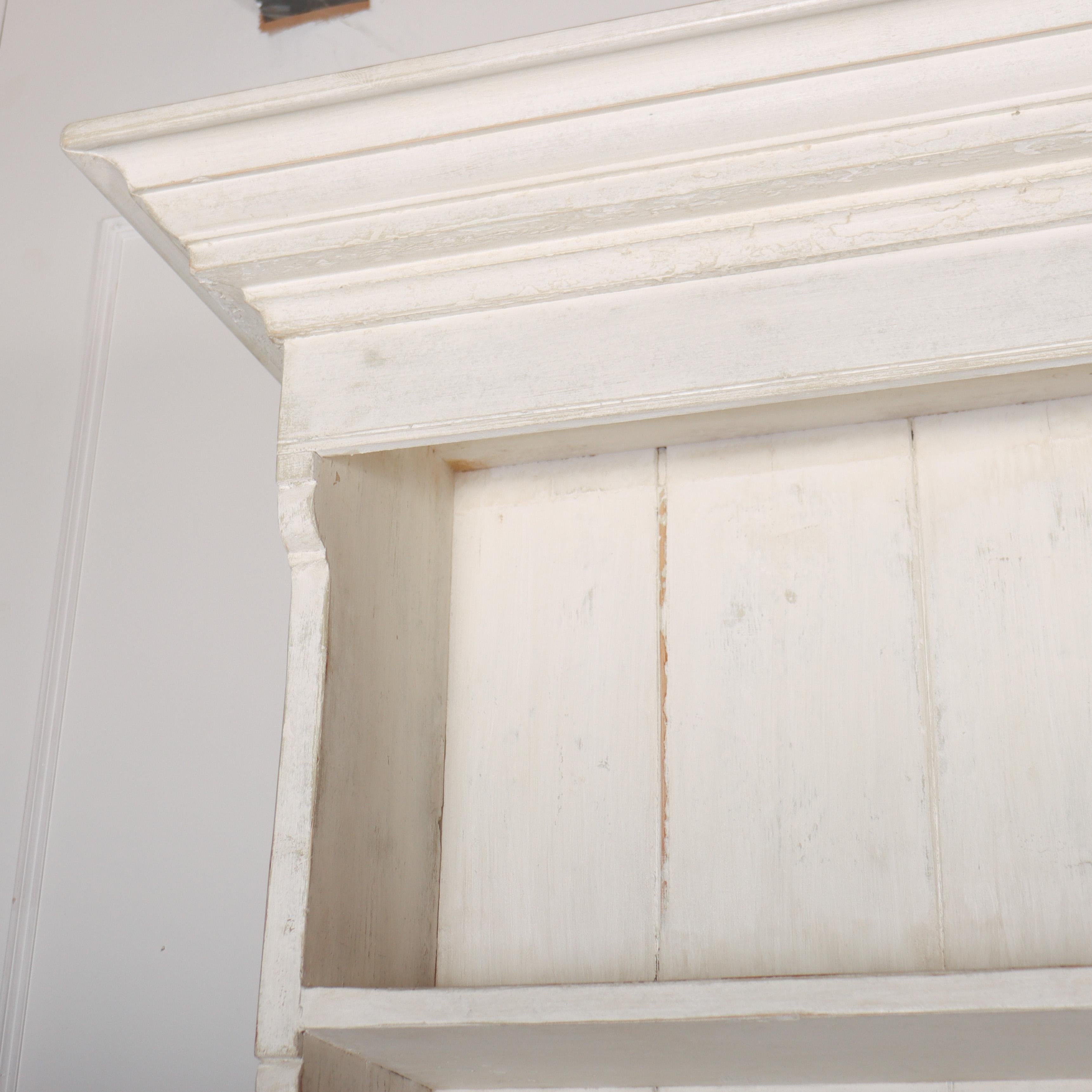 Huge early 19th century English painted pine country house potboard dresser. 1820.

Code: 8641

Dimensions:
W: 152