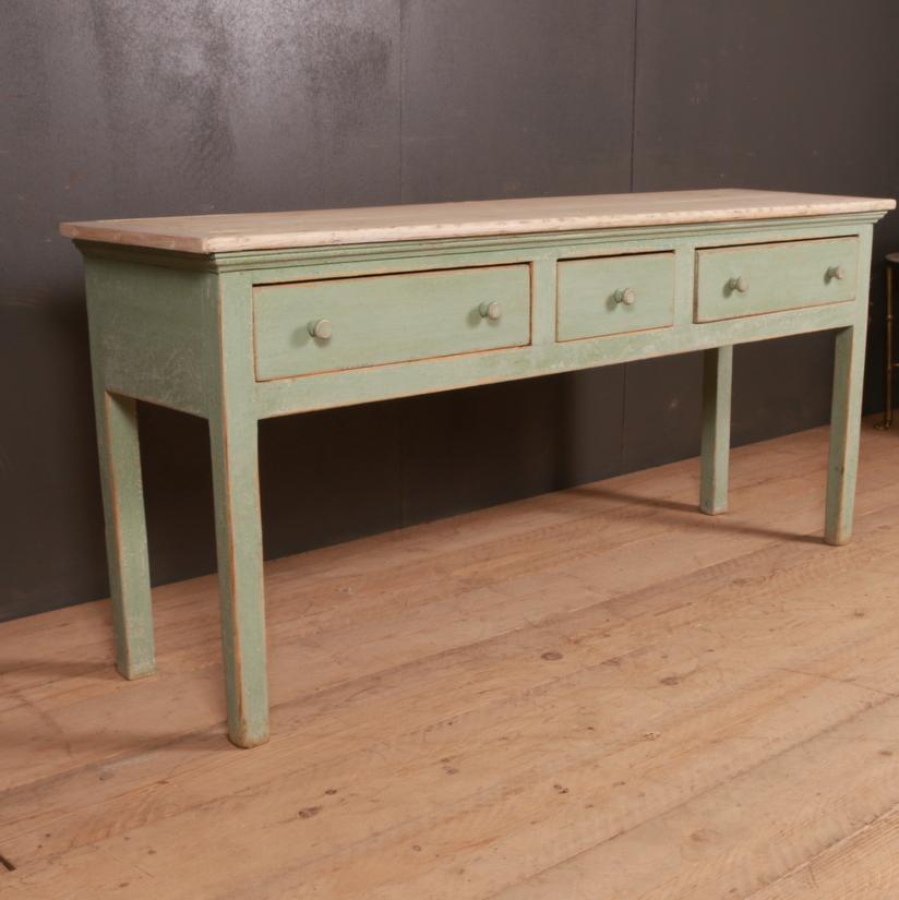Early 19th century English painted dresser base with a pale scrubbed pine top, 1820

Dimensions:
66 inches (168 cms) wide
17.5 inches (44 cms) deep
30 inches (76 cms) high.

 
