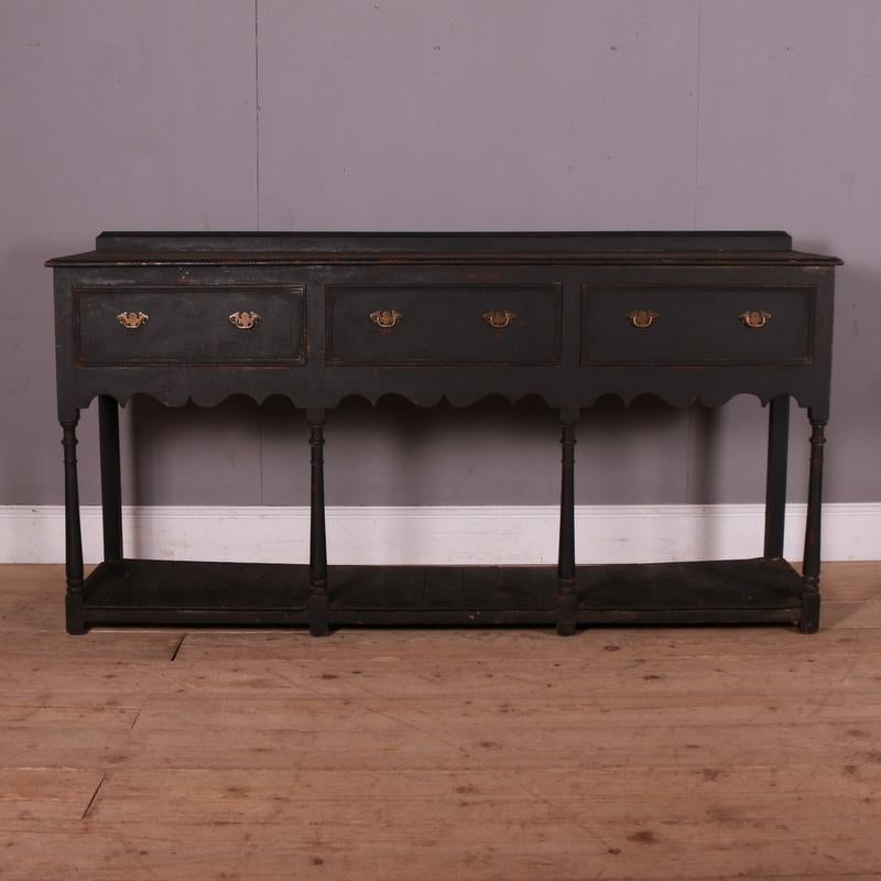 Early 20th C English painted oak dresser base in a Georgian style. 1920.

Reference: 7274

Dimensions
73.5 inches (187 cms) wide
19 inches (48 cms) deep
38 inches (97 cms) high.