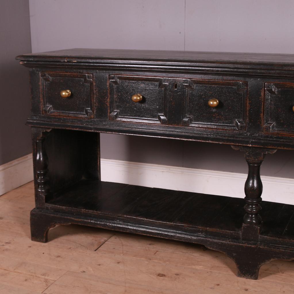 18th Century English painted 4 drawer dresser base. 1780.

Dimensions
83 inches (211 cms) Wide
19 inches (48 cms) Deep
34.5 inches (88 cms) High.

 