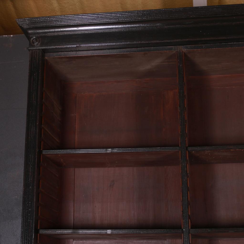Large early 19th century painted library bookcase, 1830.

The interior can be painted.

Dimensions:
75 inches (191 cms) wide
21 inches (53 cms) deep
103.5 inches (263 cms) high.