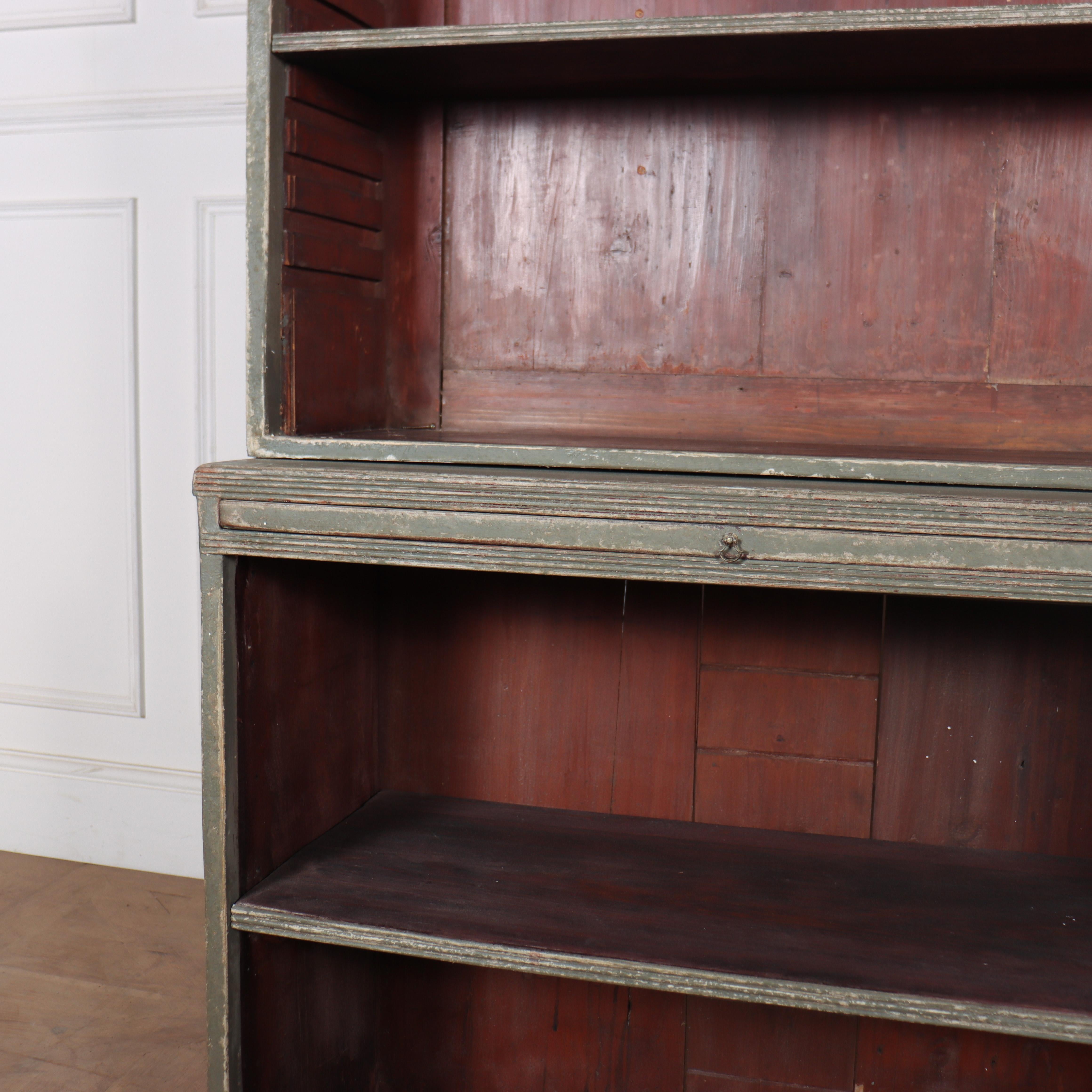 Wonderful early 19th C English painted pine open library bookcase with two brushing slides. 1820.

Reference: 7977

Dimensions
71 inches (180 cms) Wide
15.5 inches (39 cms) Deep
93.5 inches (237 cms) High
Shelf depth - Upper section is 10