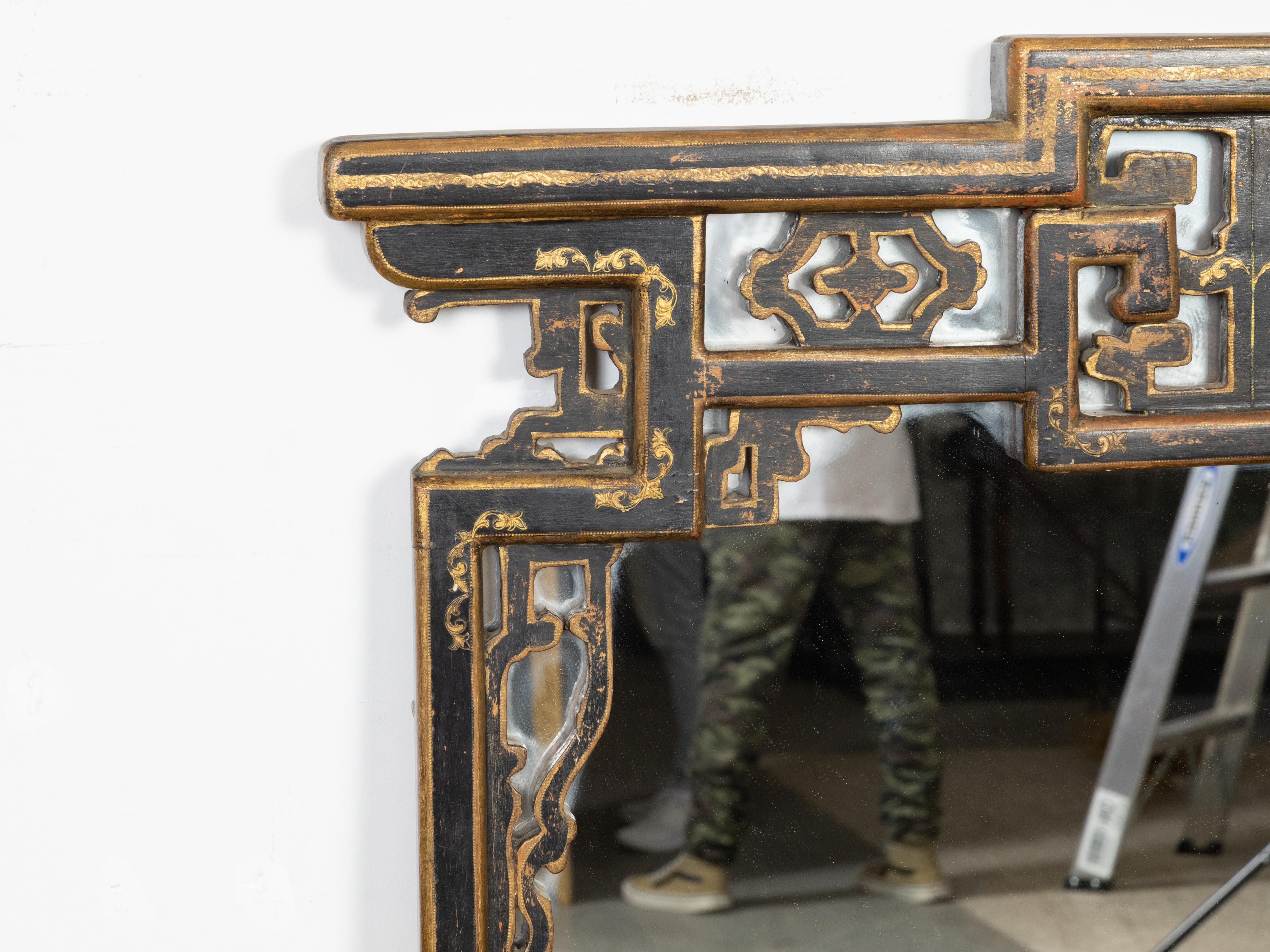 English Painted Mirror with Carved Crest and Chinoiserie Inspired Motifs In Good Condition For Sale In Atlanta, GA