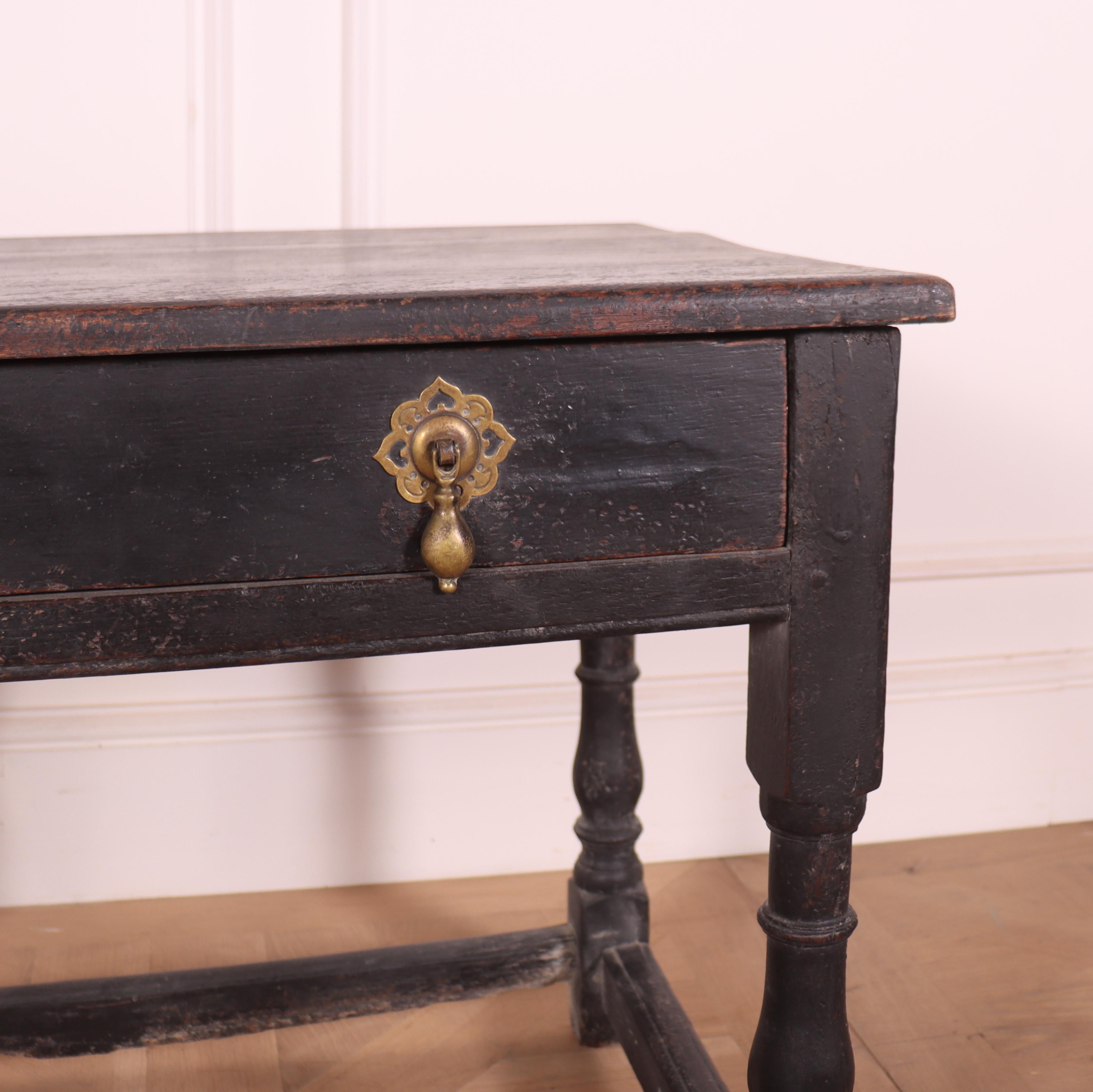 18th century English painted oak one drawer lamp table. 1780.

Reference: 7810

Dimensions
28 inches (71 cms) wide
20 inches (51 cms) deep
23 inches (58 cms) high.