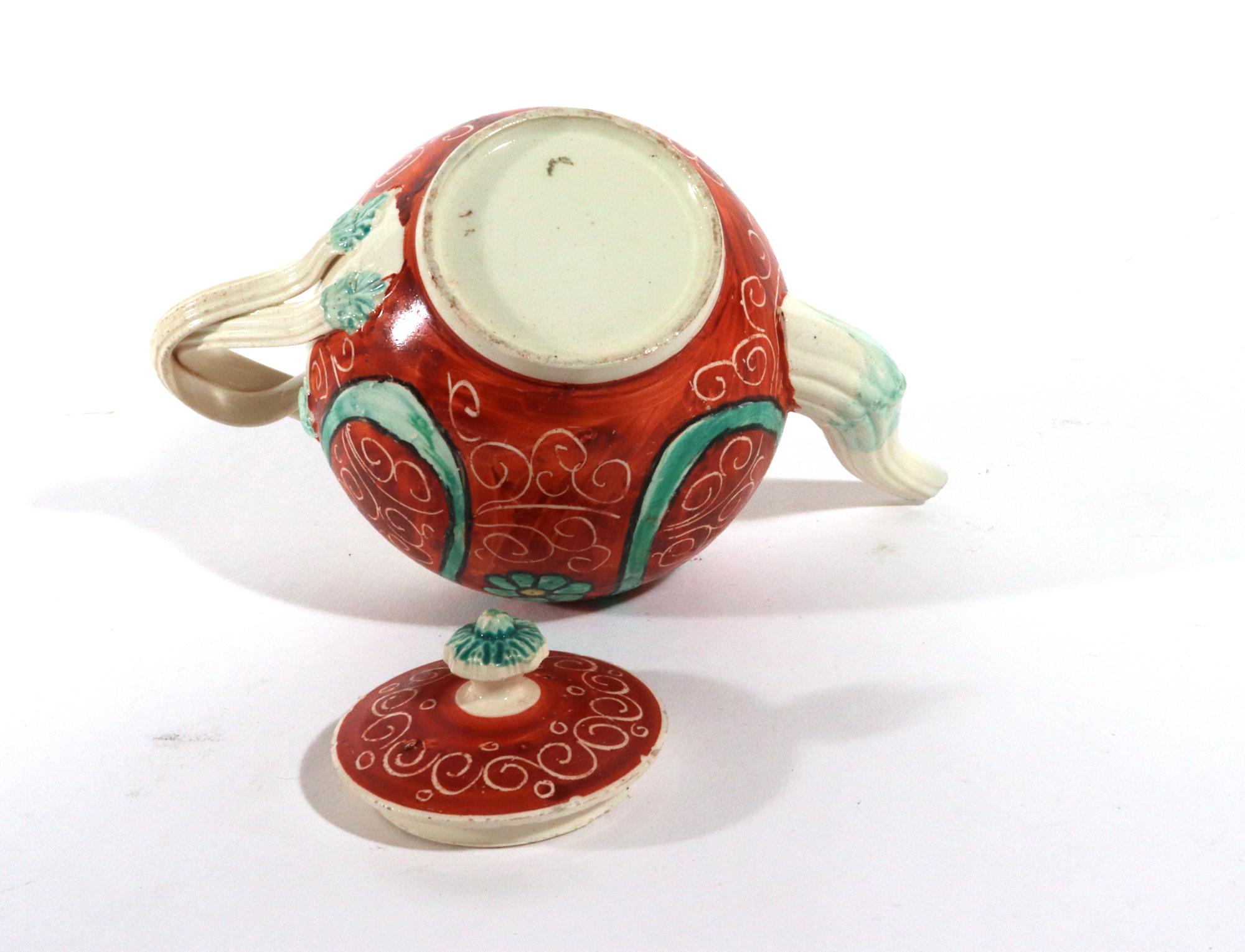 English Painted Orange-ground Creamware Teapot and Cover For Sale 2