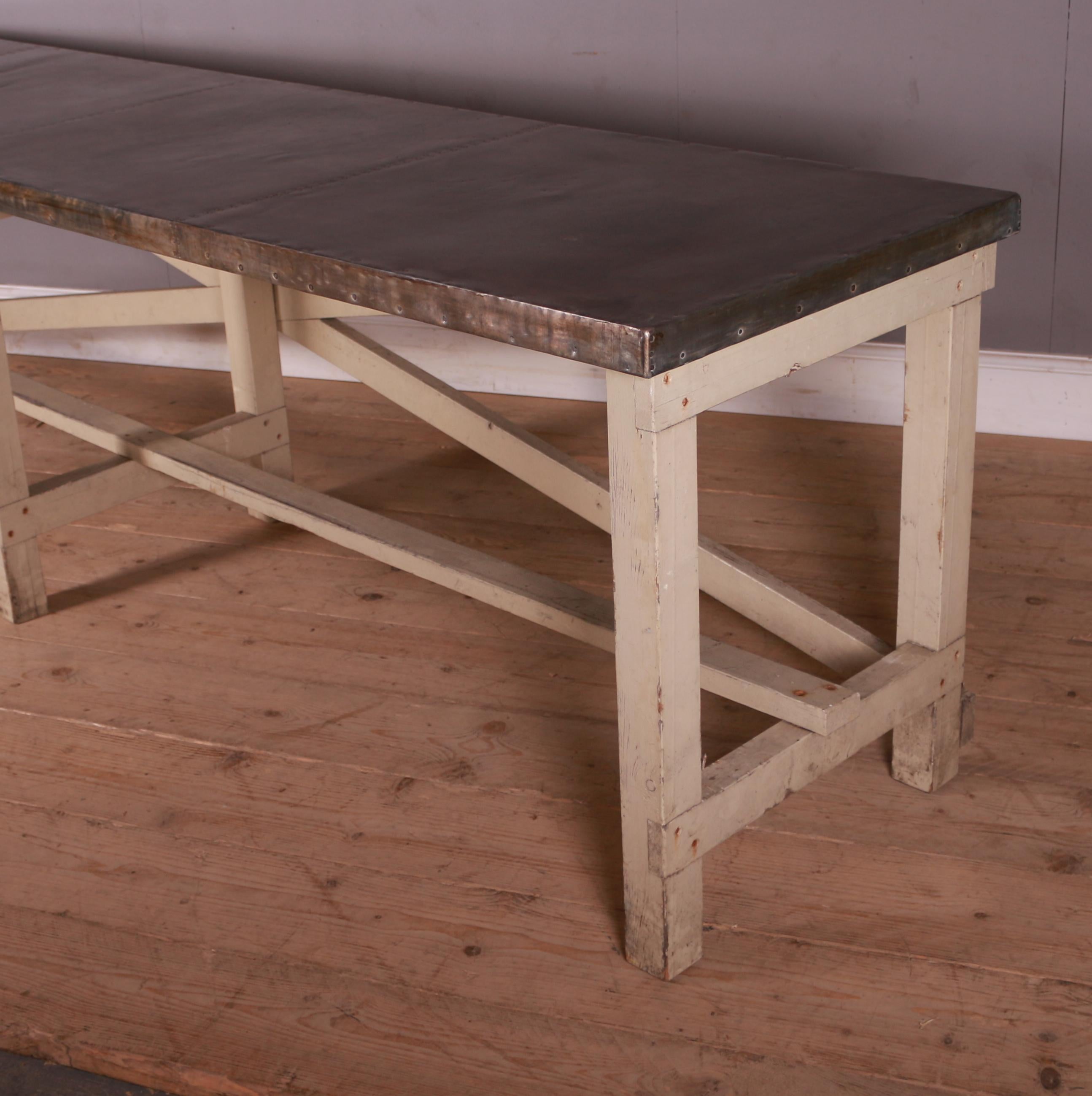 Late 19th C English painted pine prep table with an aged zinc top. 1890.

Dimensions:
120 inches (305 cms) Wide
27 inches (69 cms) Deep
32 inches (81 cms) High.

 