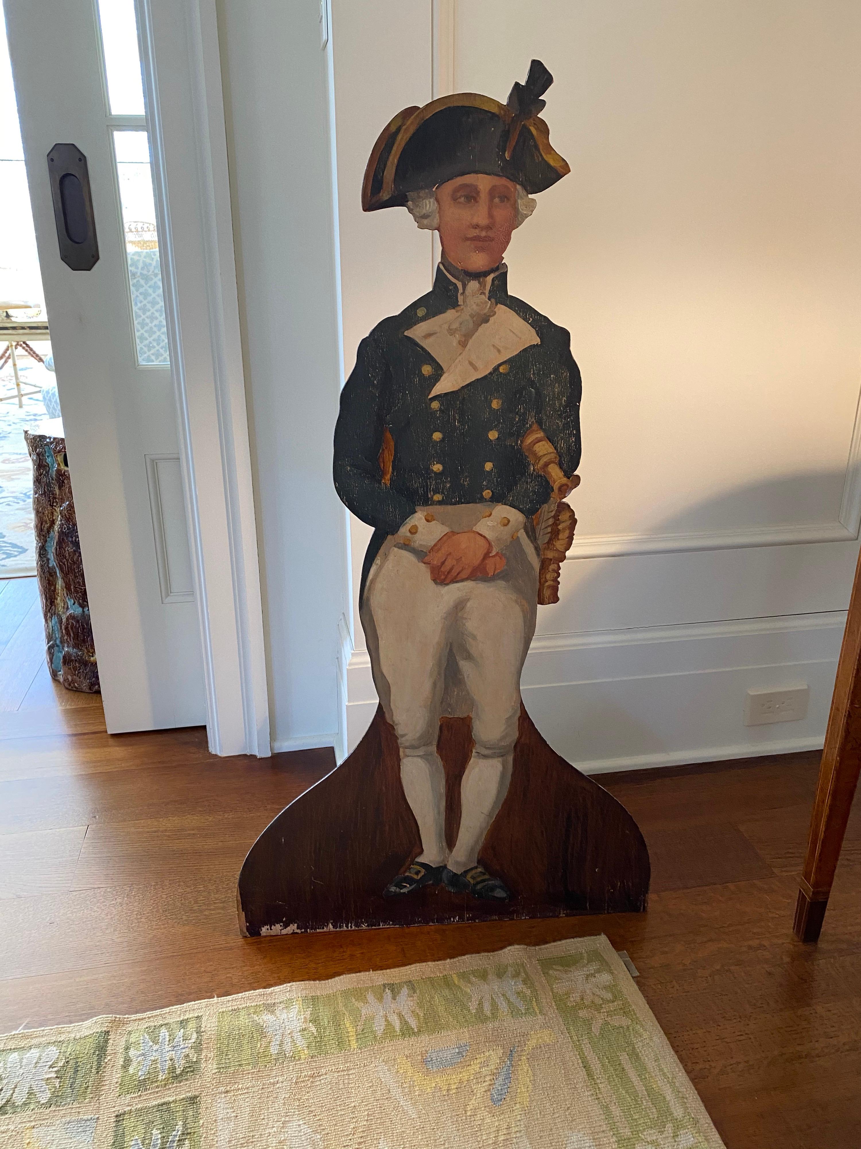 English painted wood dummy board depicting a royal navy lieutenant.
Inscribed 'Made in England' on the reverse.
Measures: 41