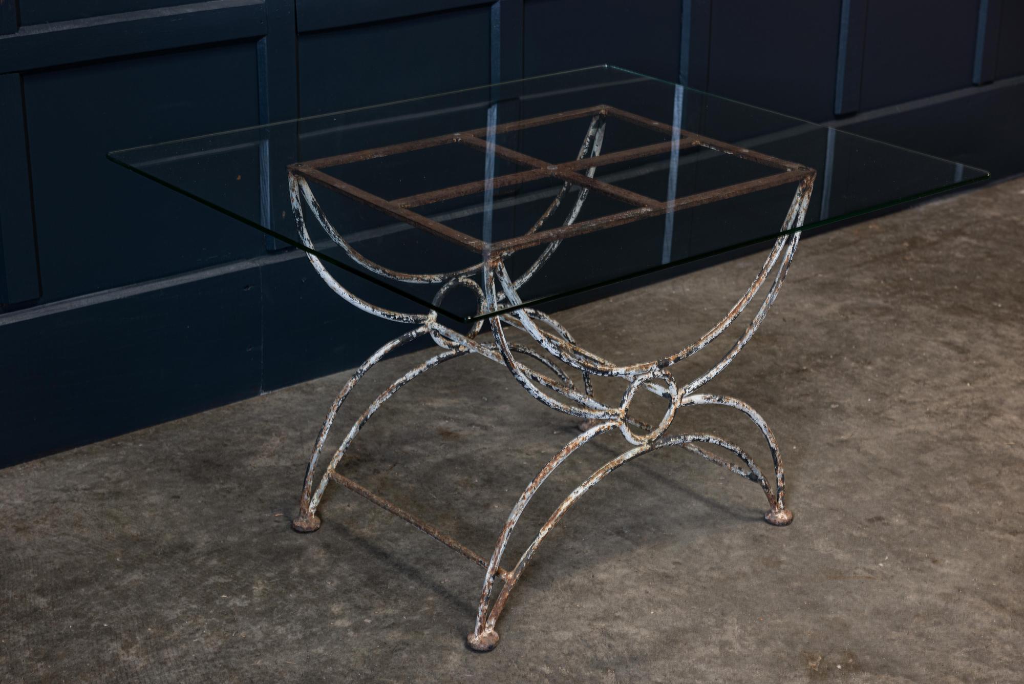 English painted wrought iron and glass coffee, side table,
circa 1930.

Painted wrought iron and glass coffee or side table. New toughened glass top on shaped wrought Iron legs.

Measures: W 80 x D 66.5 x H 46cm.
