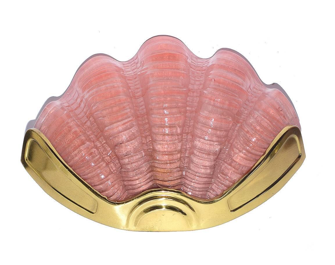 A beautiful pair of two matching 1930s Art Deco wall lights of shell form. The gilt frames are in very good original condition which when fitted to the wall hold the beautiful soft pink glass shades firmly in place. Truly beautiful and will work