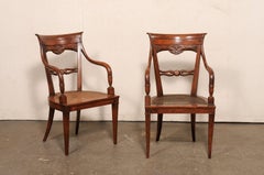 Paire de fauteuils en bois et cannage magnifiquement sculptés, fin C.I.C.