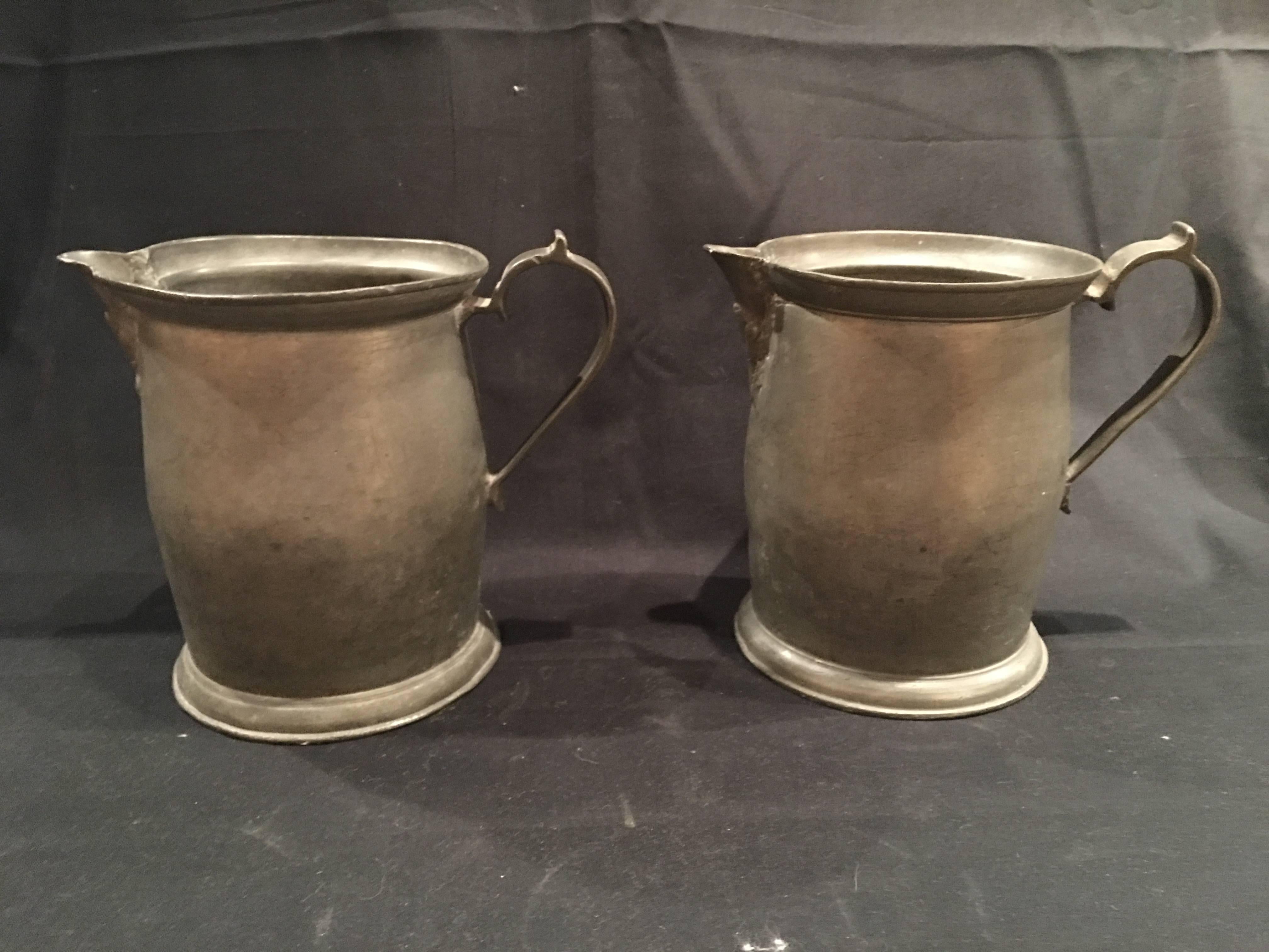 English pair of Pewter mugs or cups with handles, 19th century.