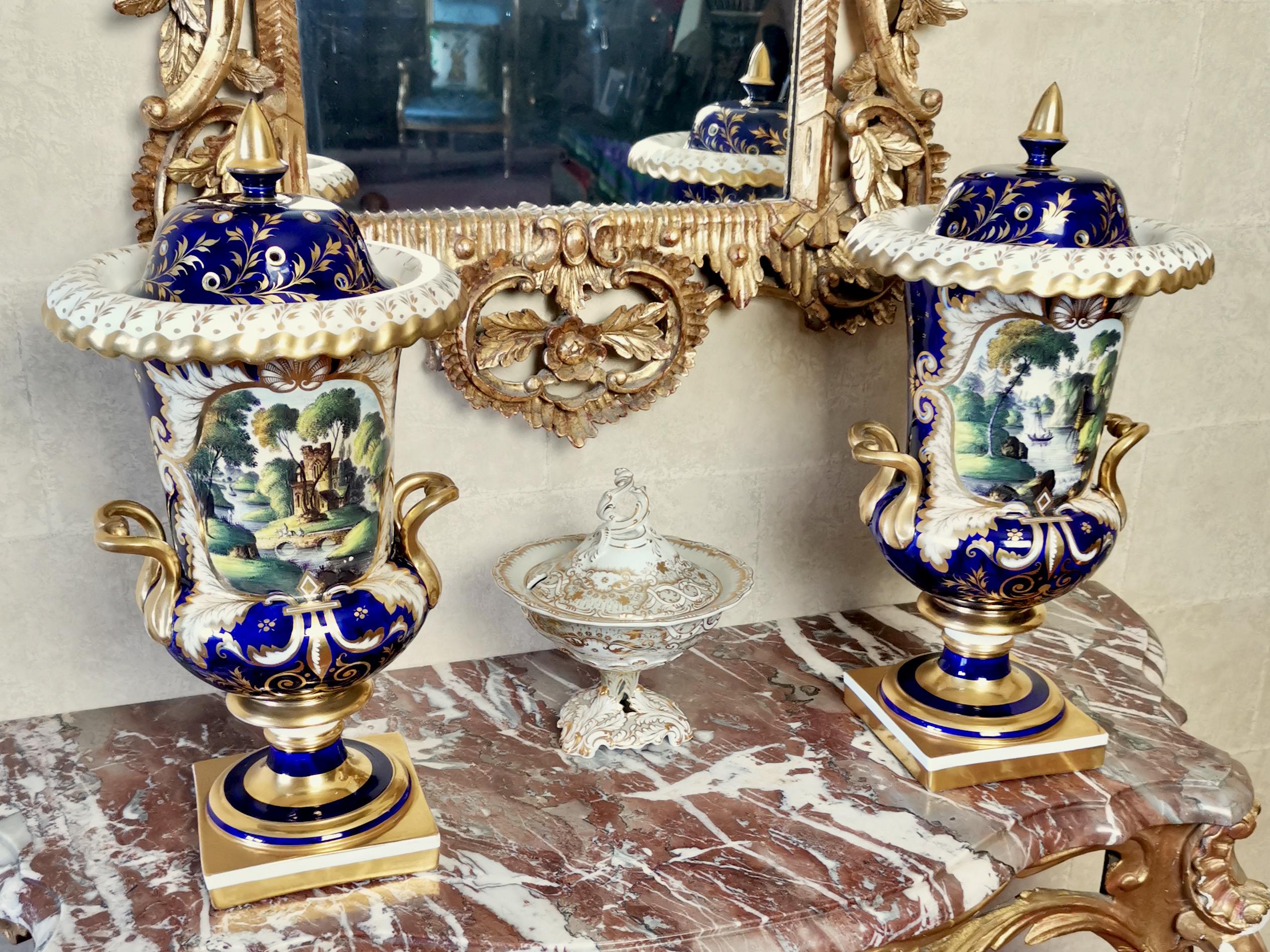 On offer is a stunning pair of potpourri vases with covers, made by one of the great English (and probably Staffordshire) factories in about 1830. The vases are in excellent condition with some light restoration and have stunning gilding and hand