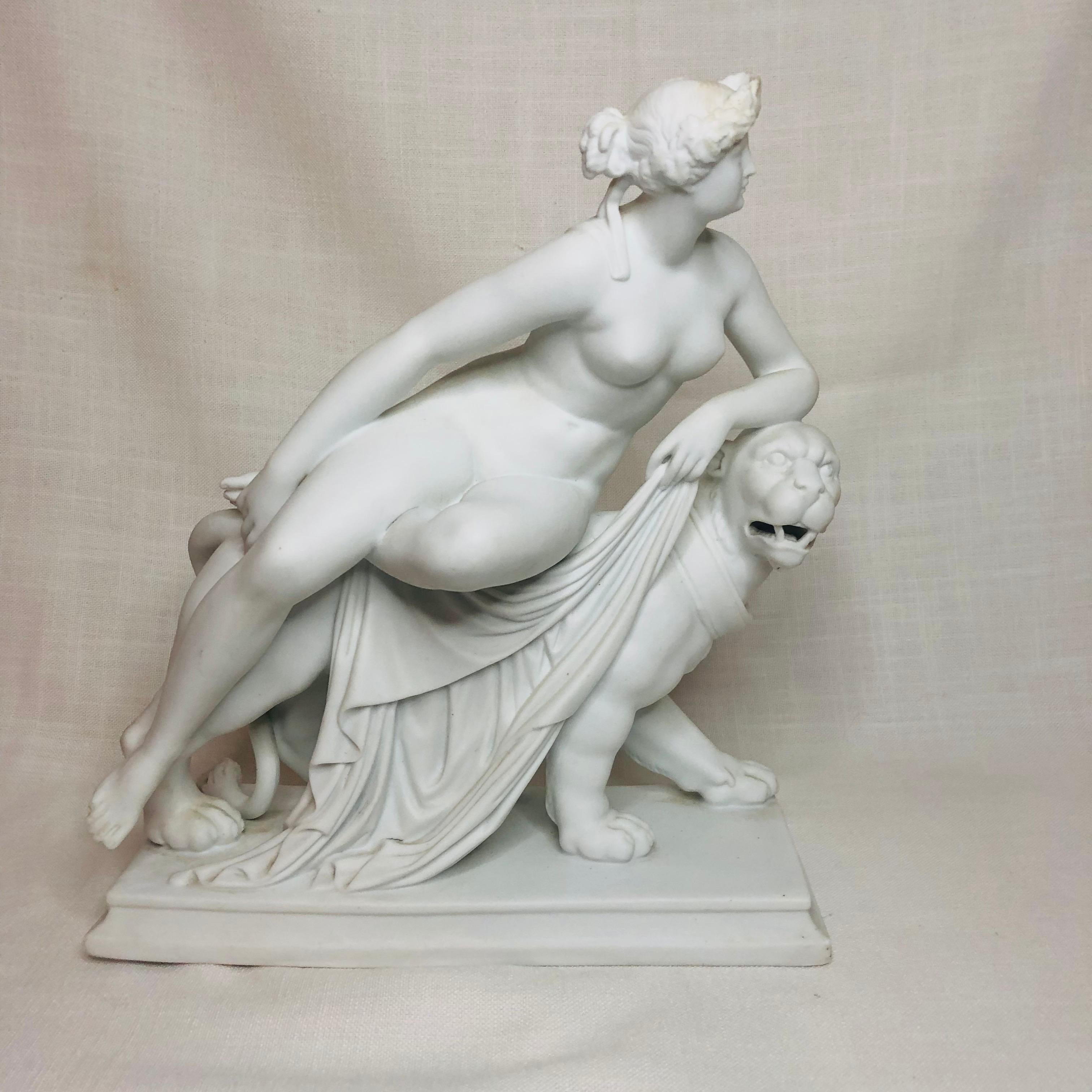 I want to offer you this spectacular nineteenth century English parian figure of Adriadne who is riding on top of a panther. As you can see from the pictures, this white parian figurine of this lady and panther is beautifully modeled by the artist.
