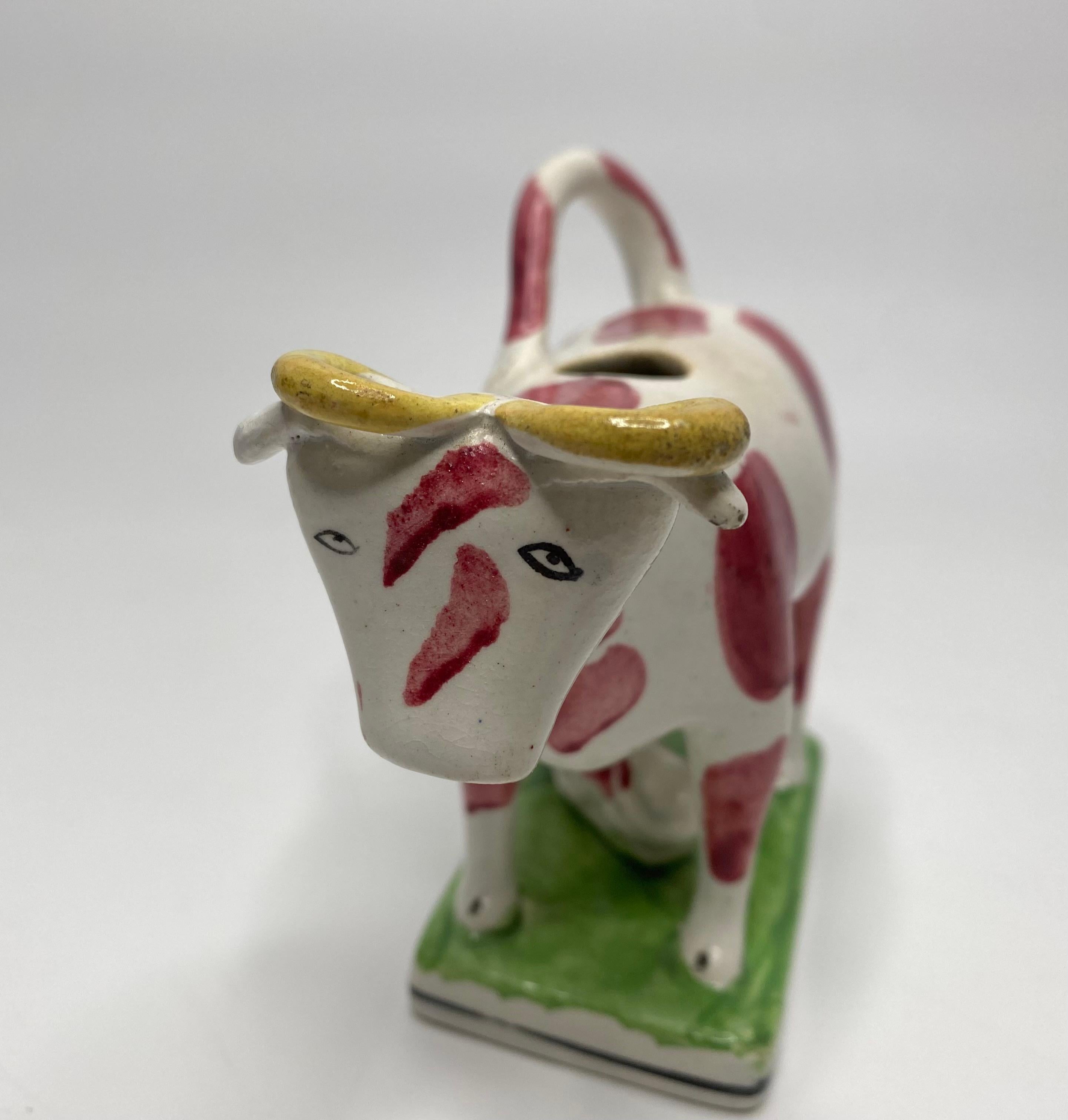 Fired English pearlware cow creamer, c. 1830.