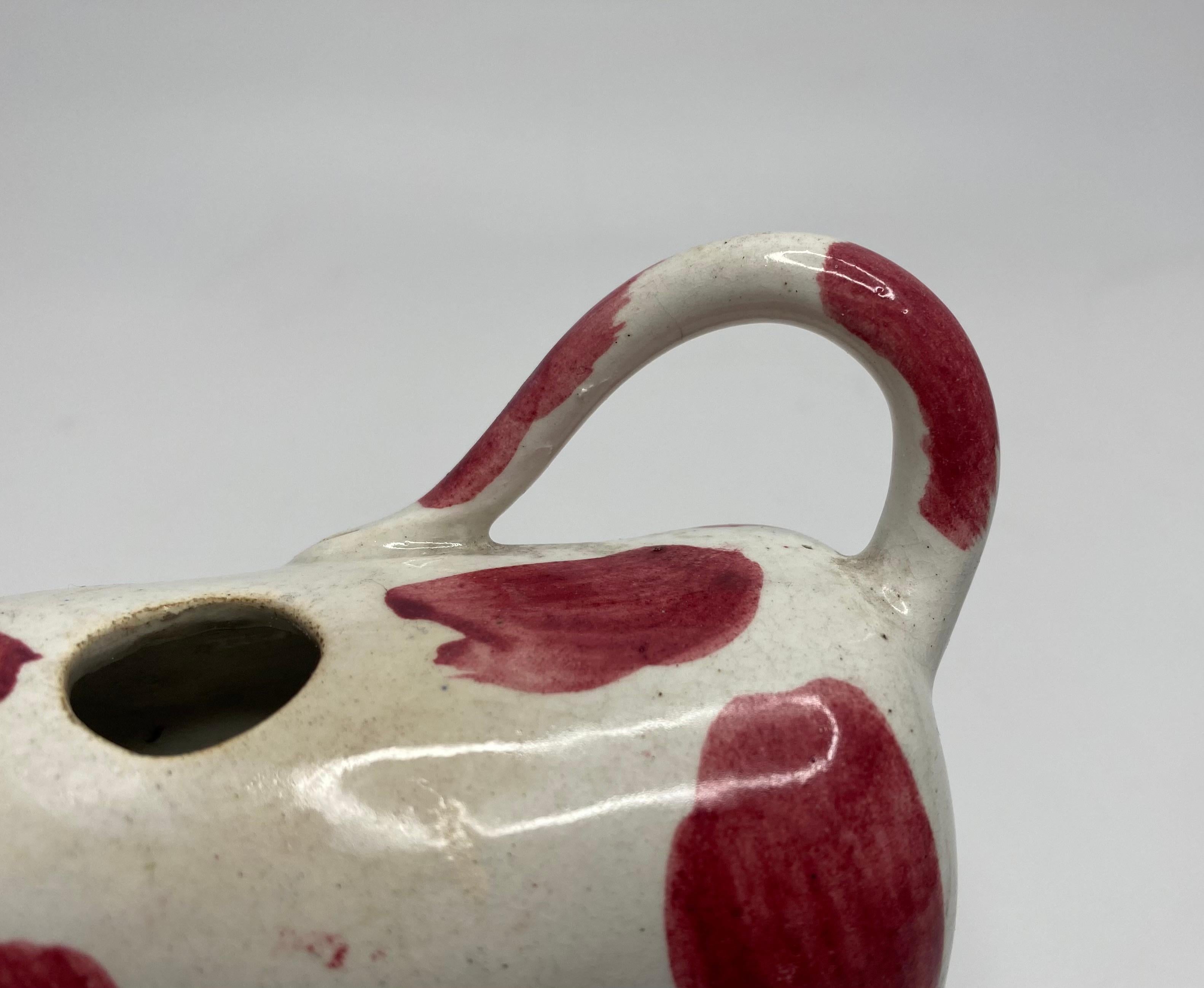 Mid-19th Century English pearlware cow creamer, c. 1830.